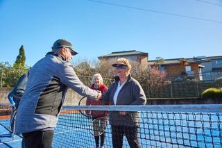 Residents playing tennis