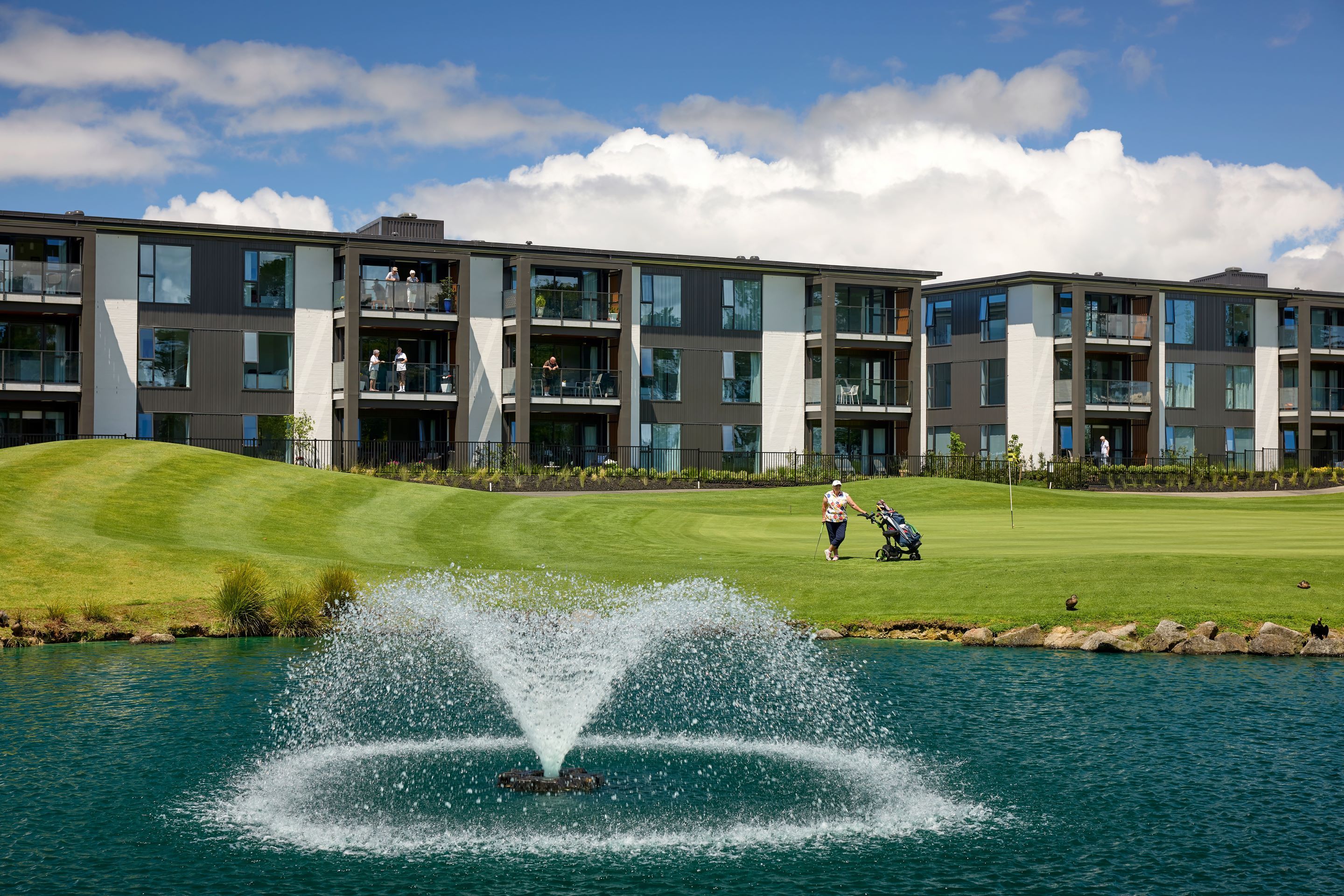 view from golf course facing apartments