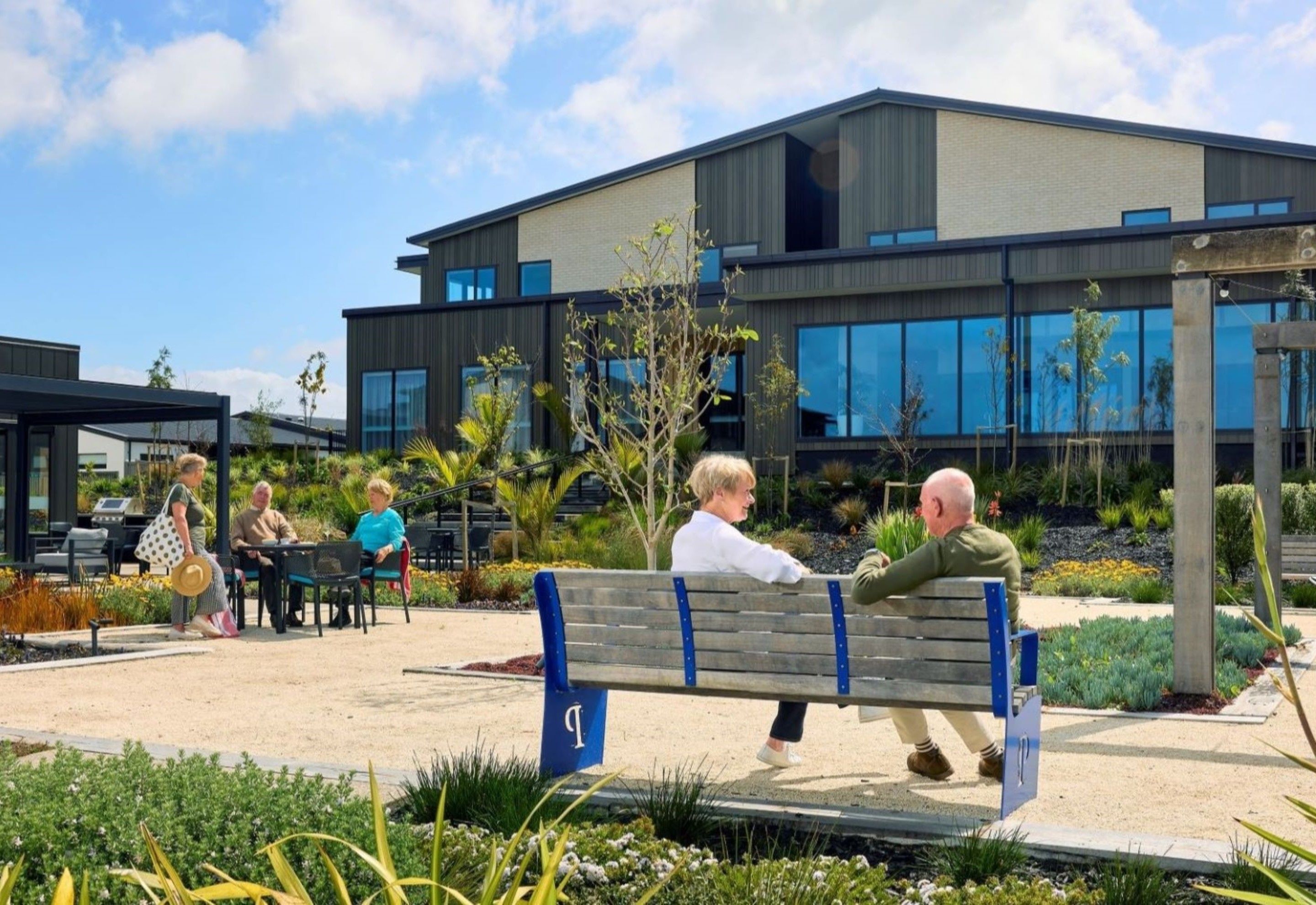 Residents enjoying sunny outdoor area