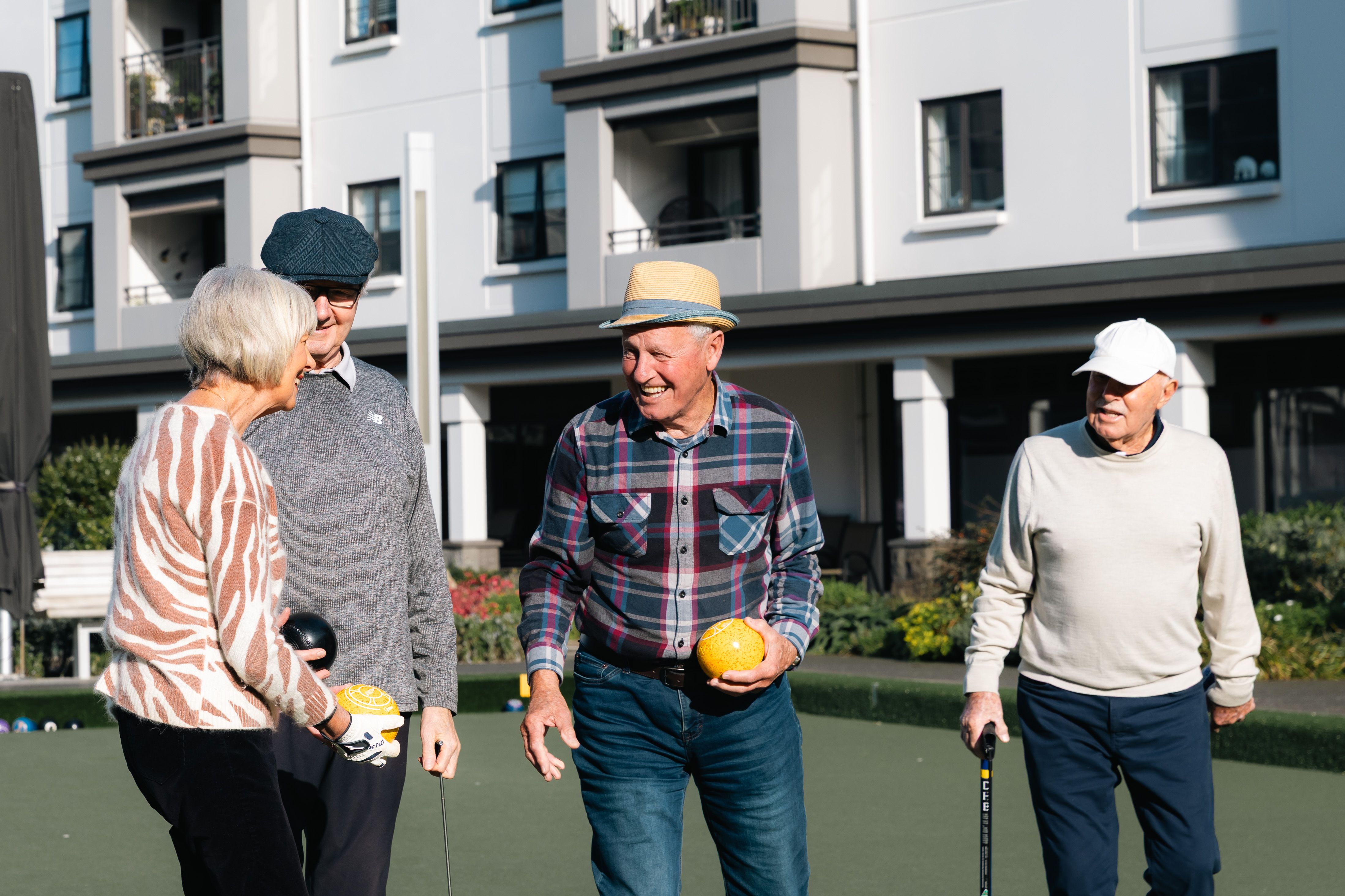 Residents playing lawn bowls