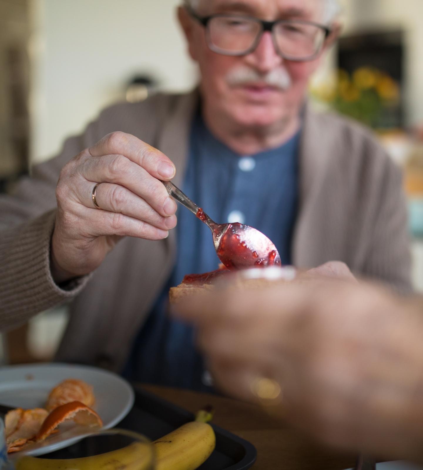 man having breakfast