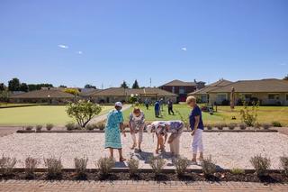 Residents playing petanque at Longford Park