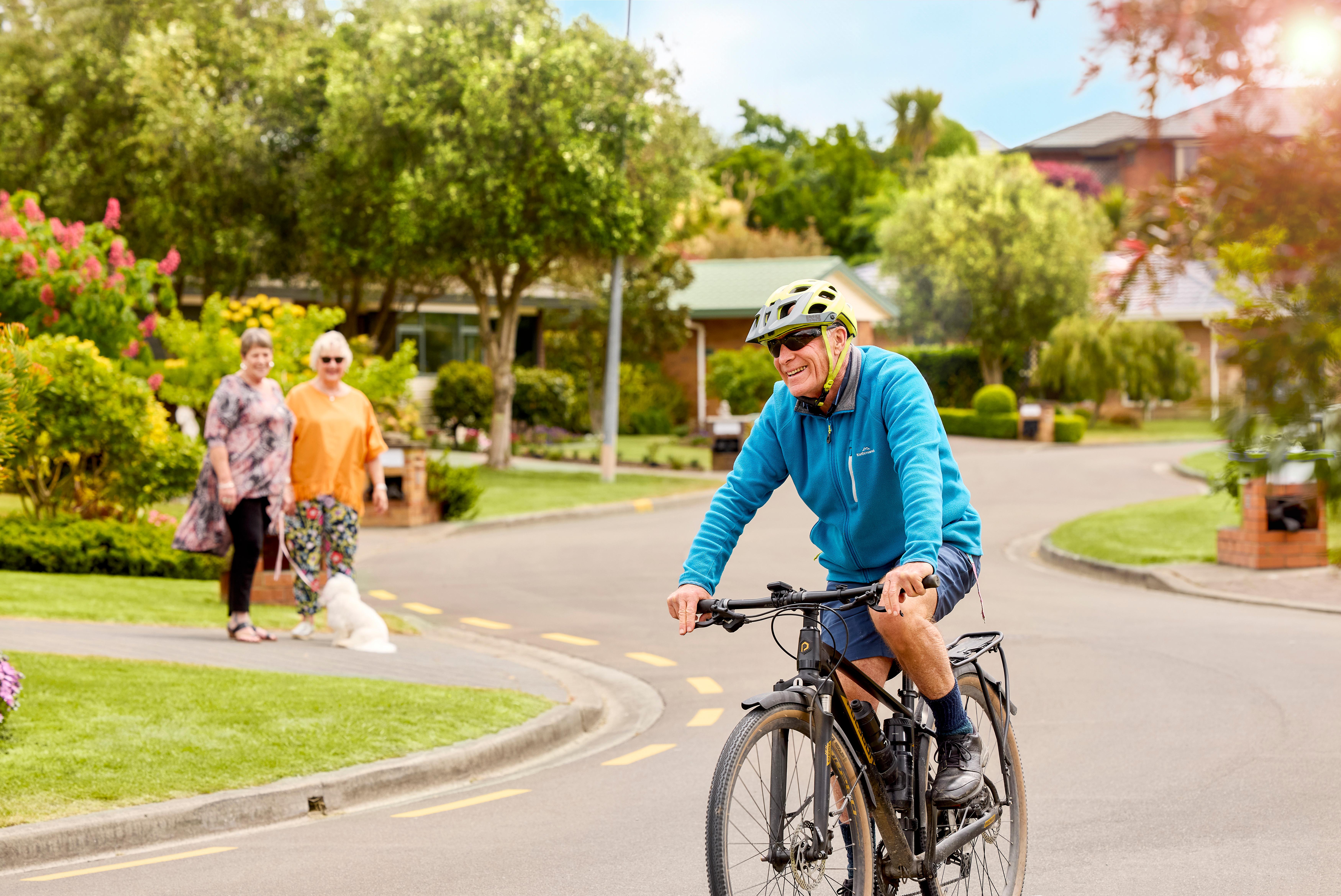 Resident riding his bike around Kapiti Village