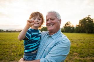 Resident with young boy smiling