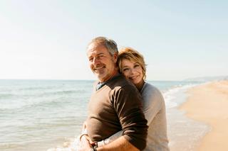 Couple hugging at the beach