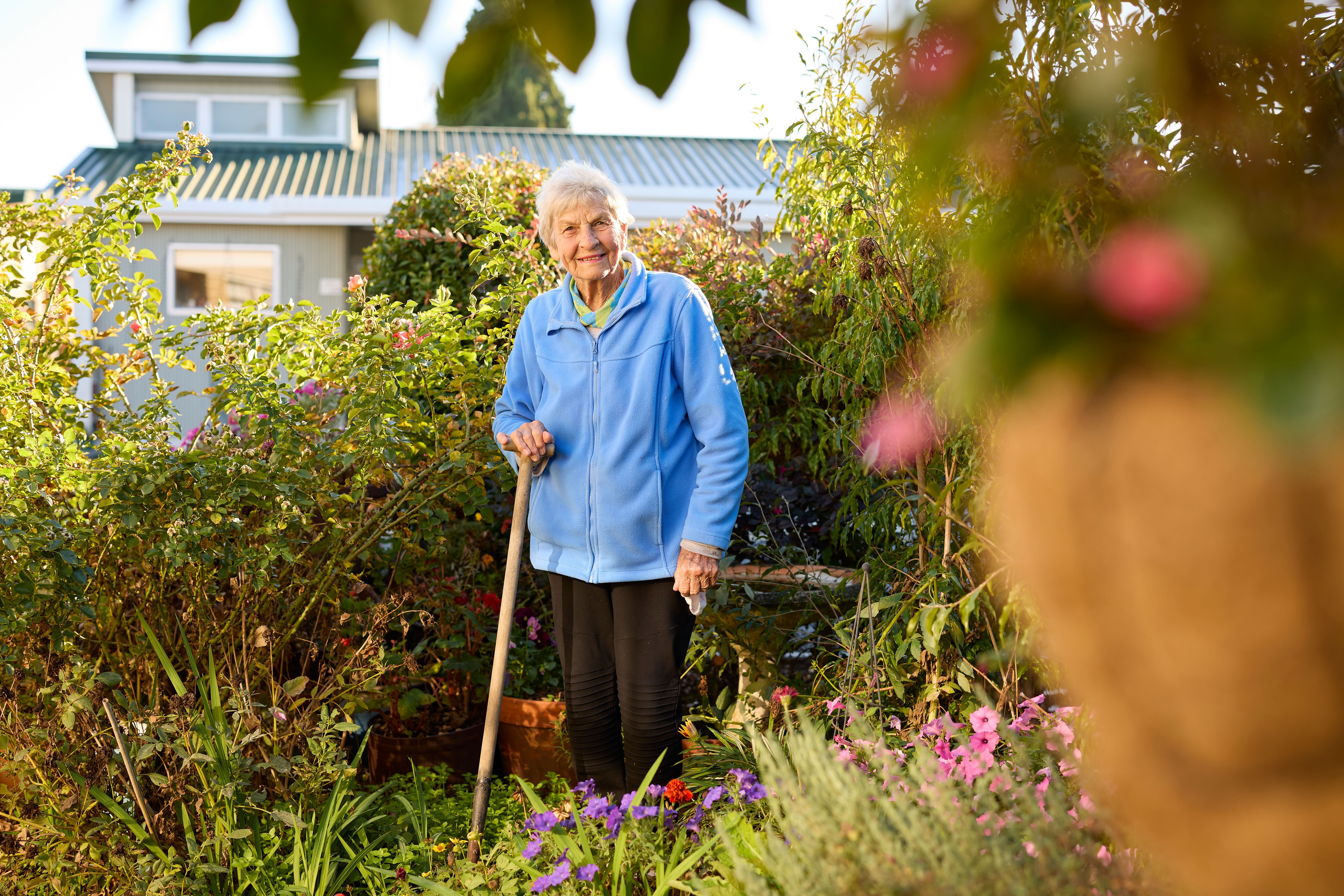 Metlifecare St Andrew's Cambridge lady gardening