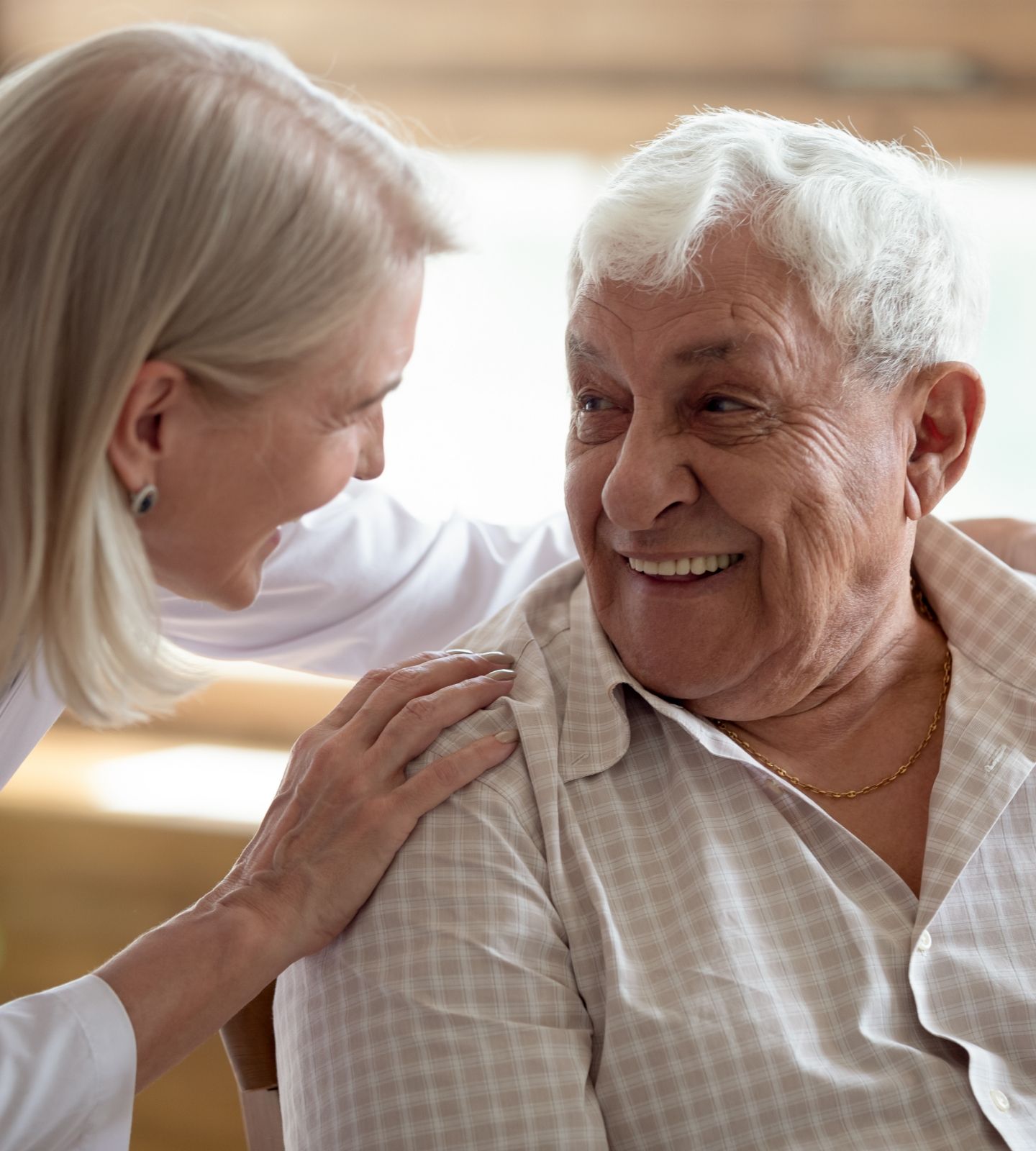 Metlifecare retirement village resident talks to a residential aged care nurse