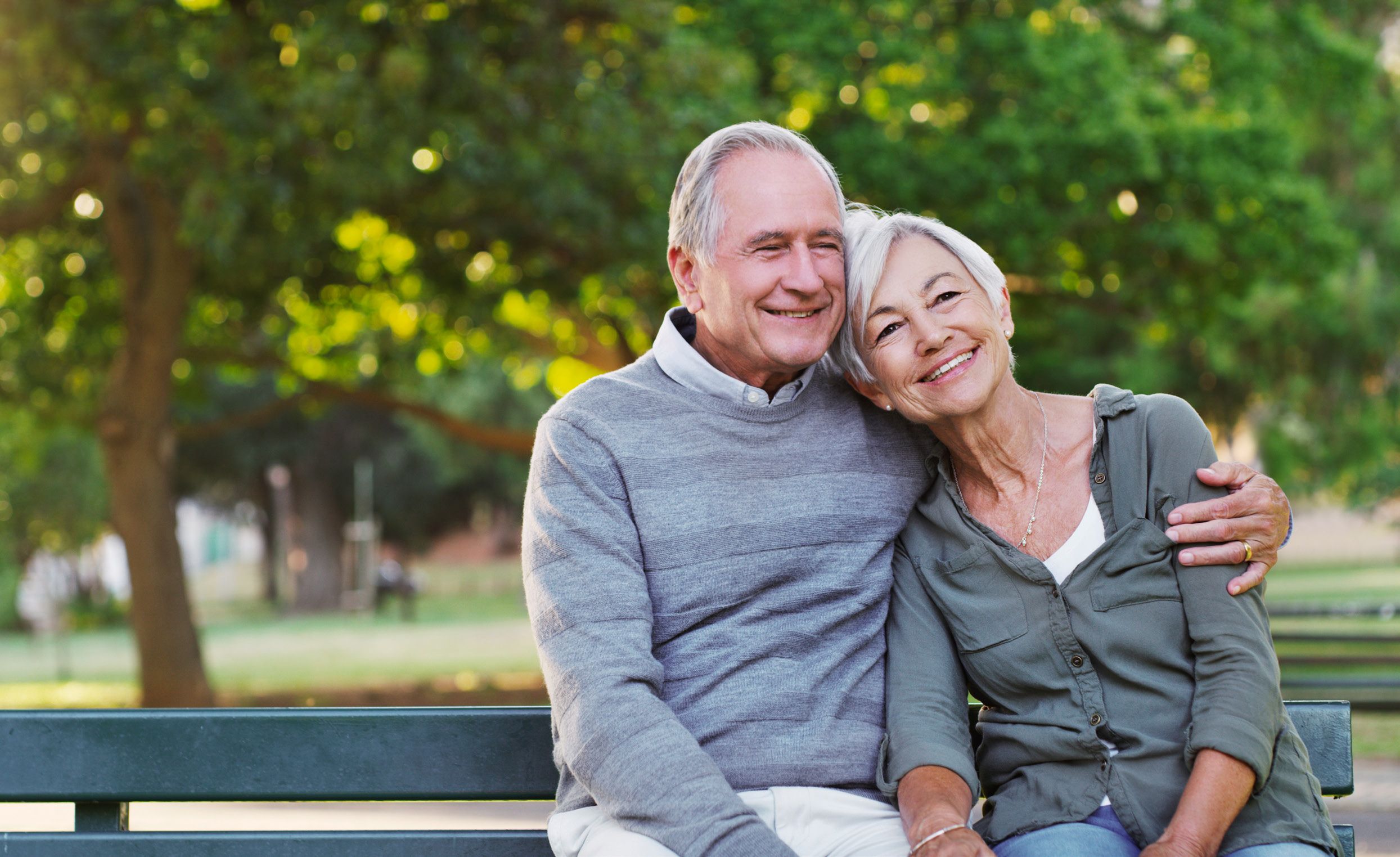 Older couple on a park bench