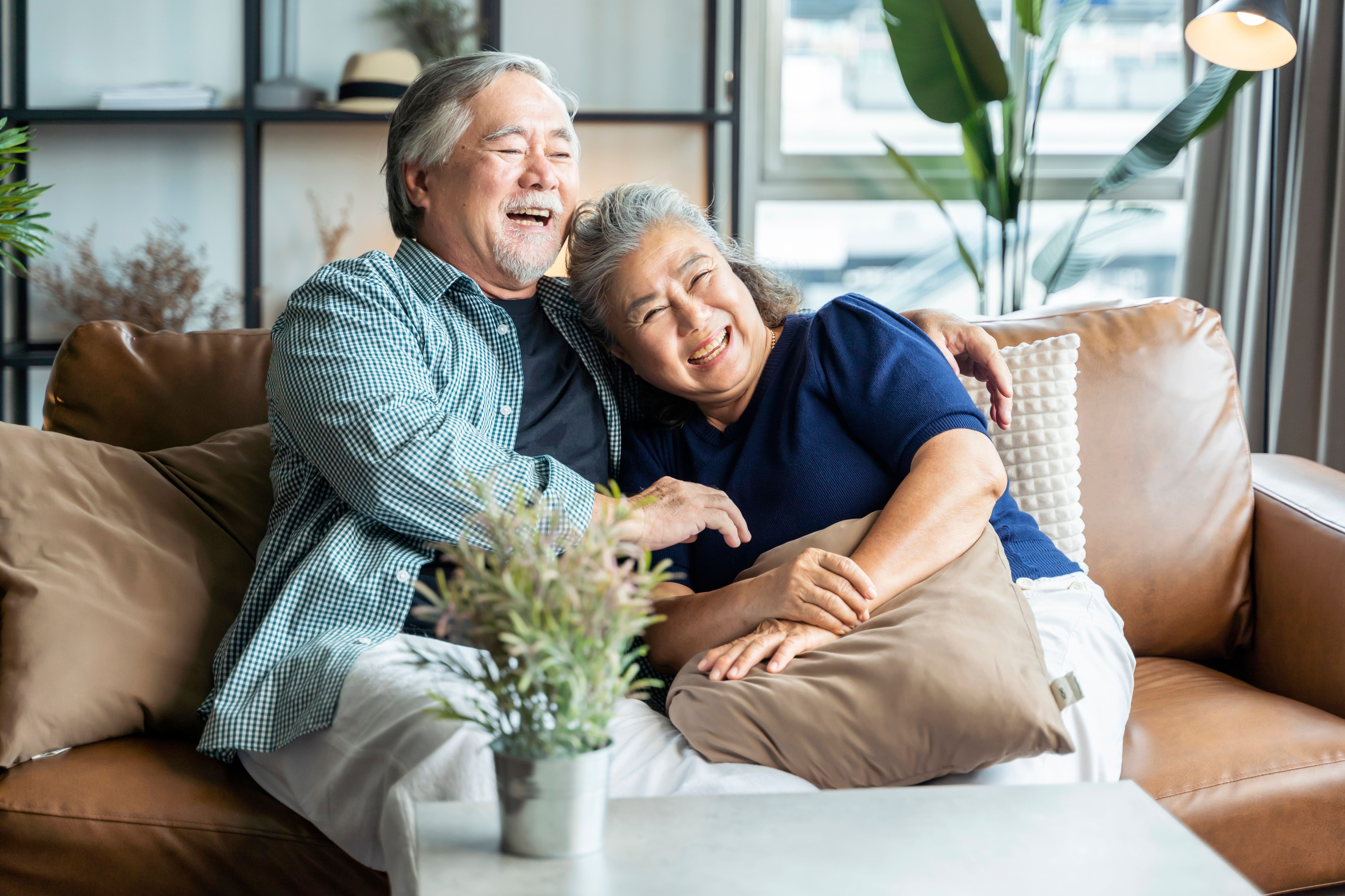 Couple in retirement village and enjoying NZ retirement home apartment living