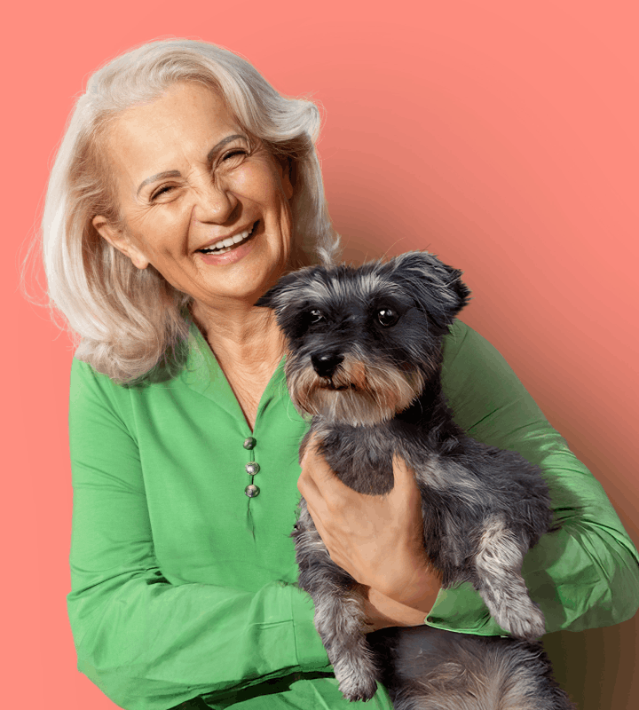 Resident with dog on peach