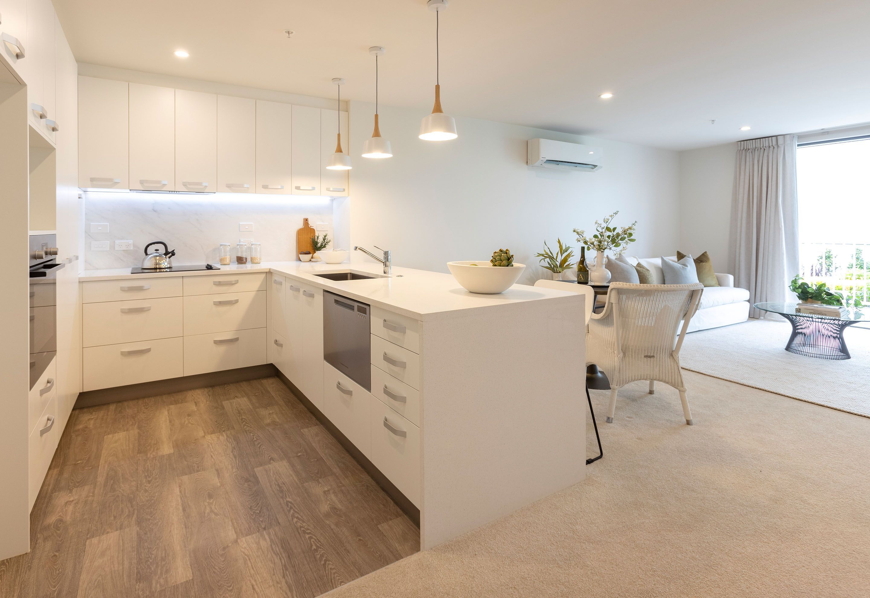 Kitchen, dining and living area in an apartment at Greenwich Gardens