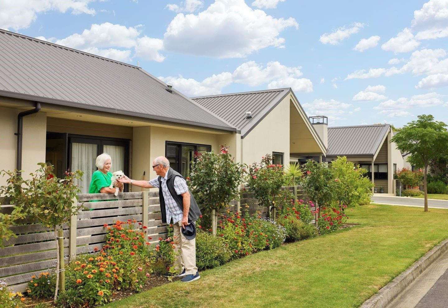 Residents greeting each other at Springlands Village