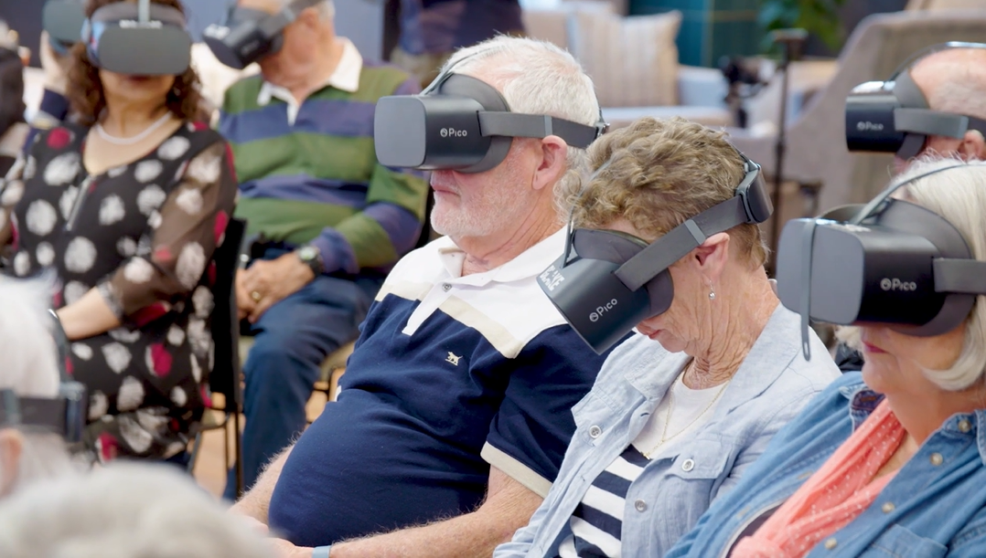 Metlifecare residents experiencing virtual reality together — watch the video to see how technology brings joy and connection to New Zealand retirement living.