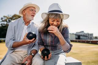 Residents playing bowls and laughing