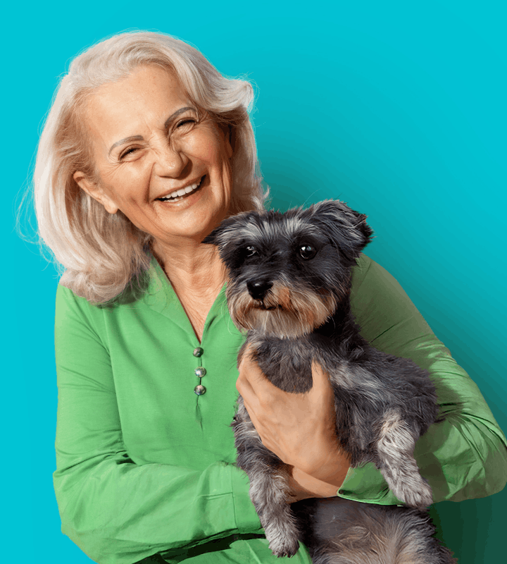 Lady with dog on blue