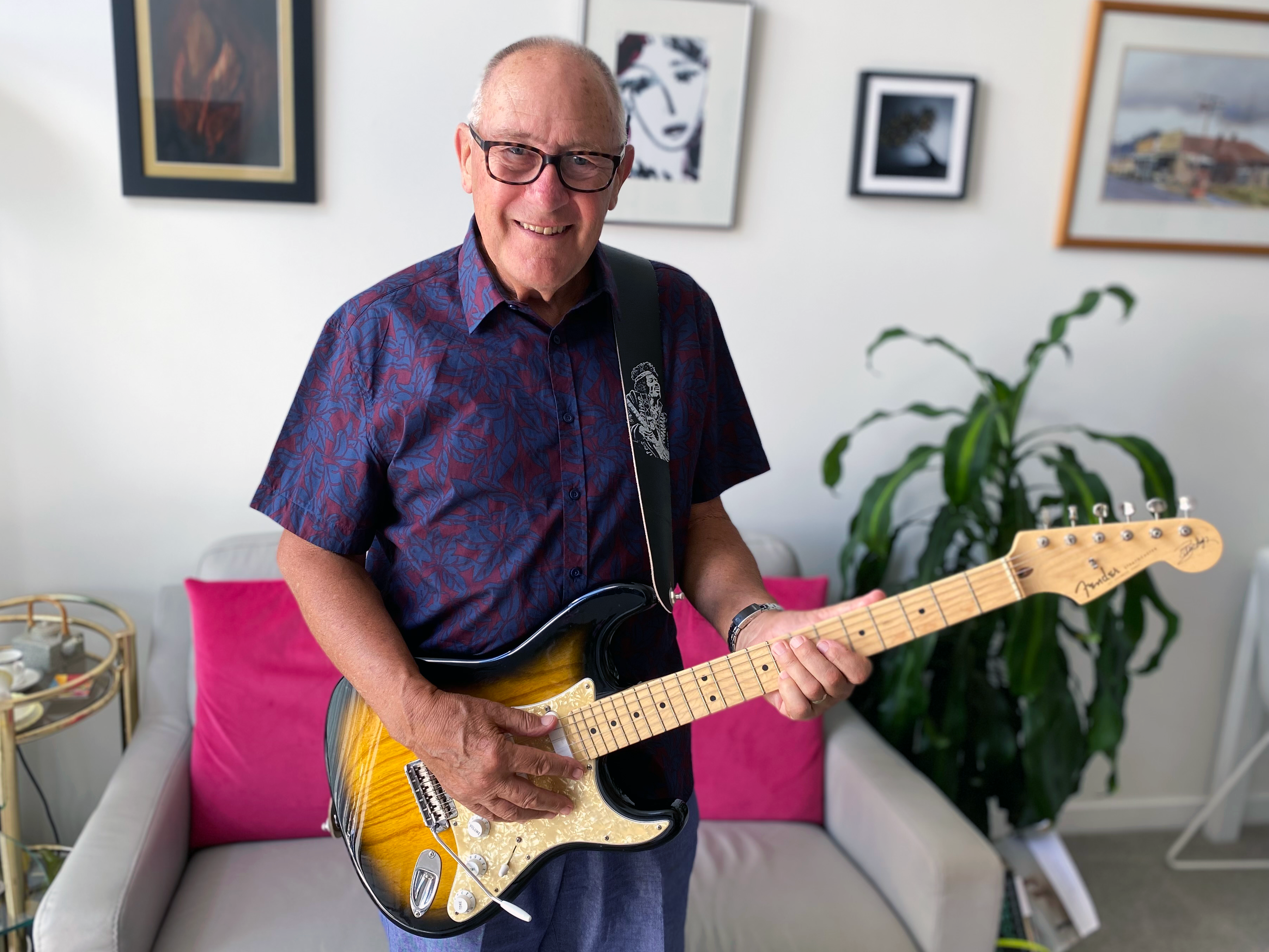 Dave Clark with his electric guitar