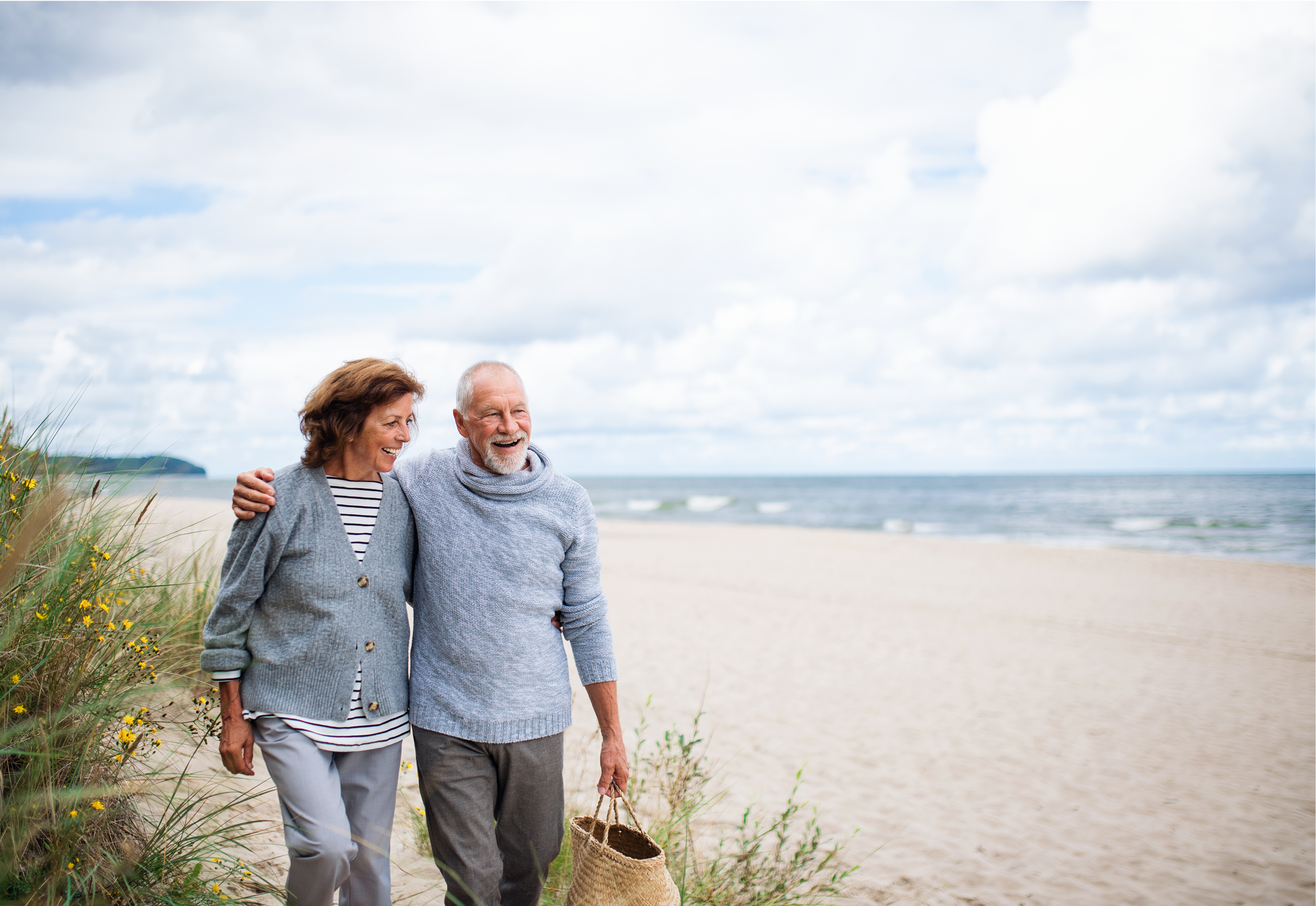 Coastal Villas Residents walking along beach