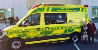 Warren and Justene Taylor standing next to the ambulance that was donated.