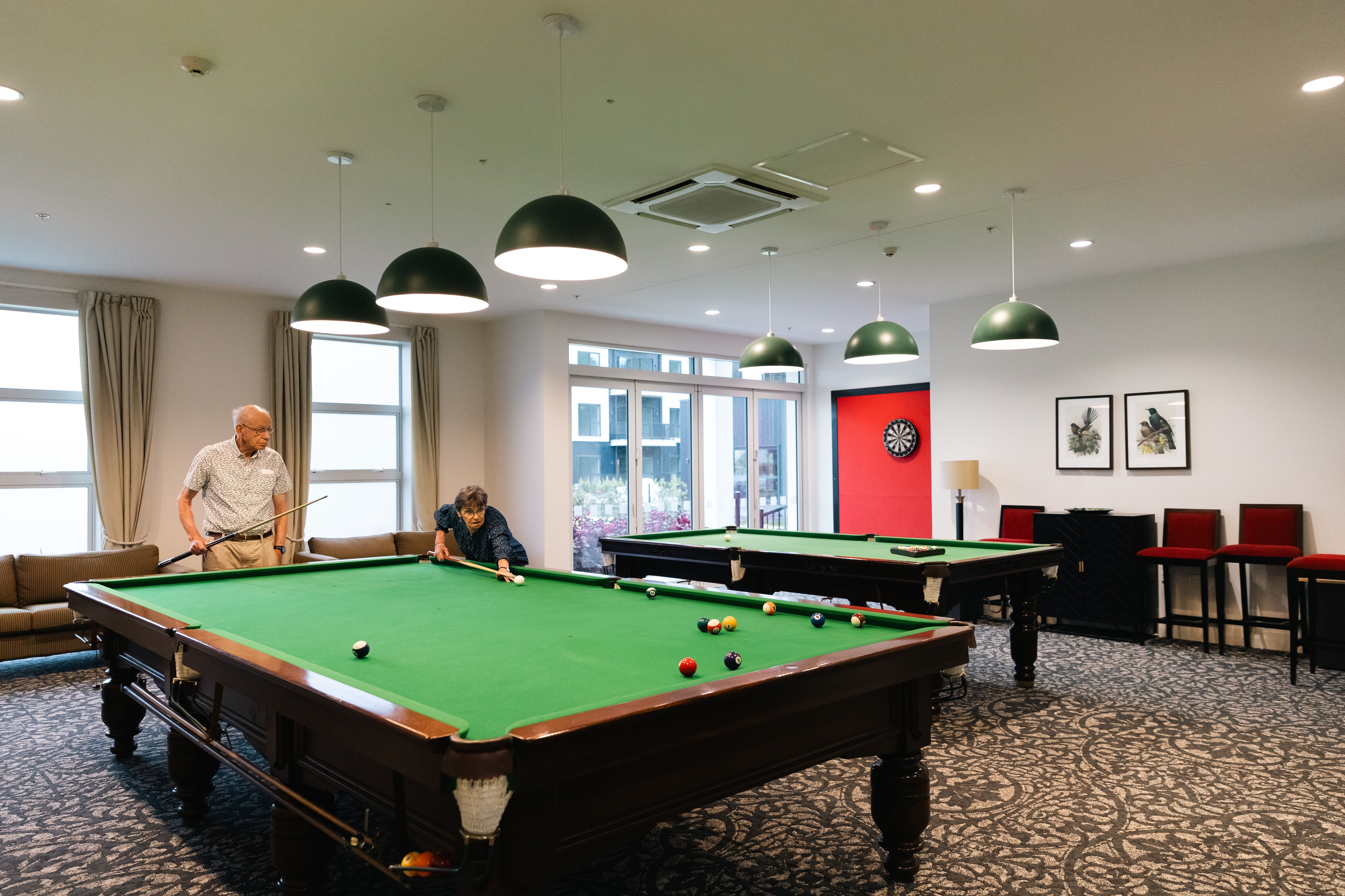 Residents playing pool