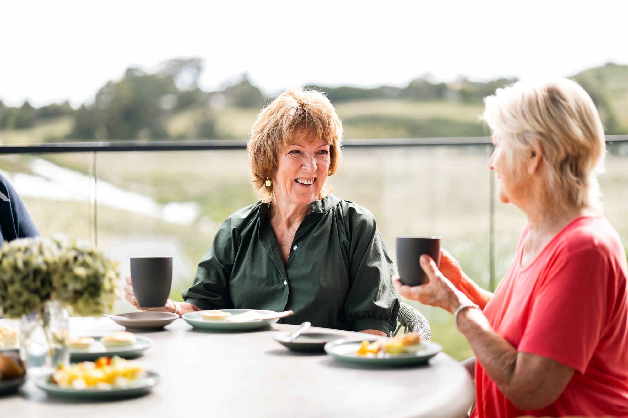 Residents enjoying food from cafe