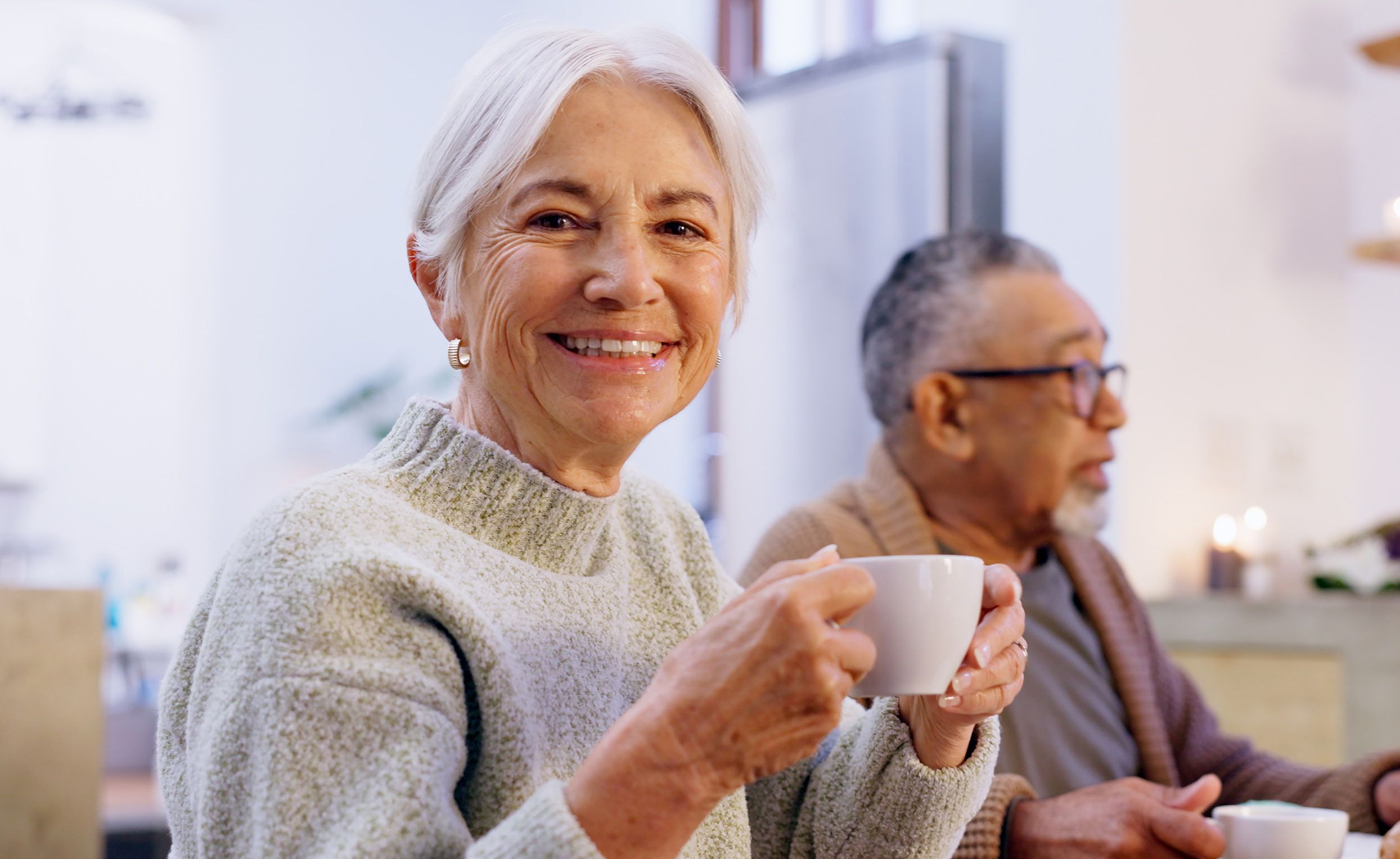 Older lady with a hot drink