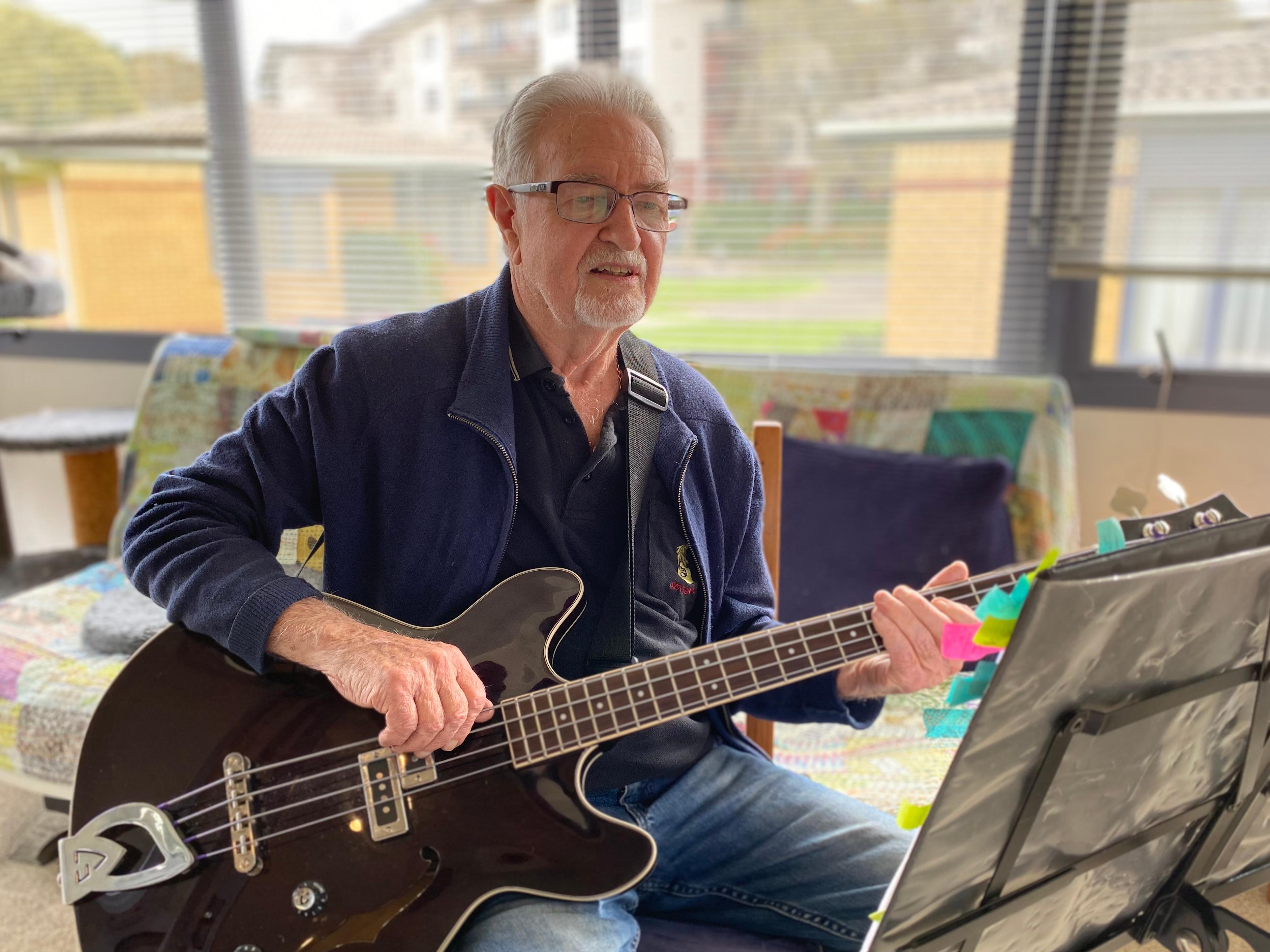 Lou Walters with his bass guitar