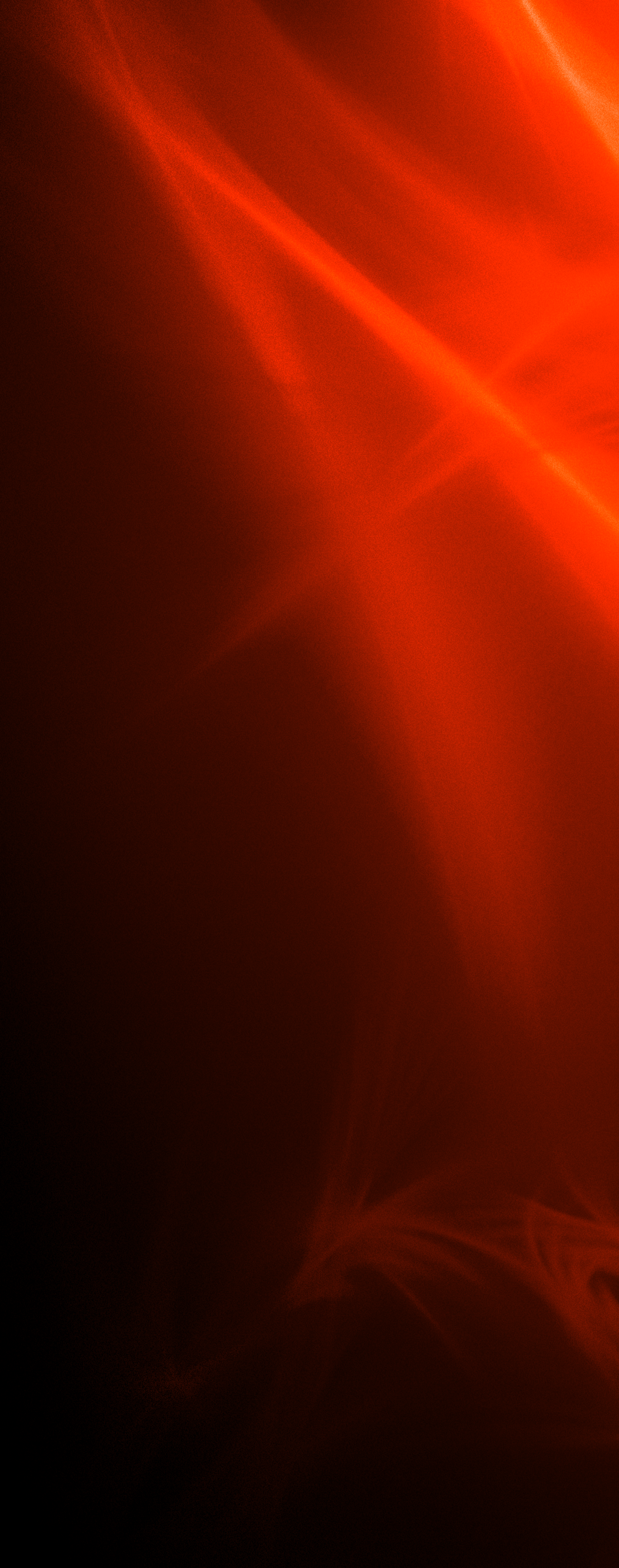 Black background image with red , orange and  white light flares