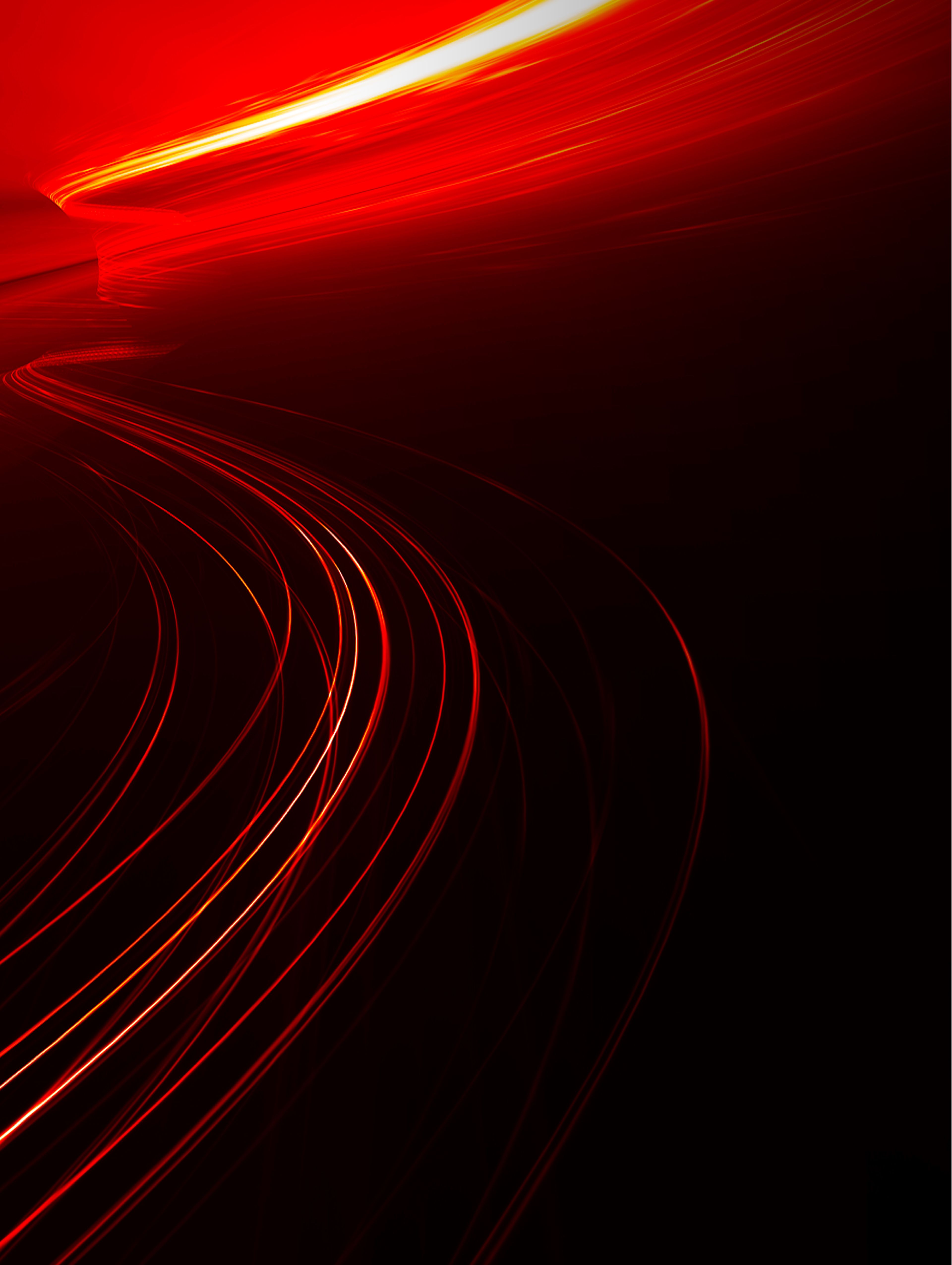 Black background with white, red , orange light flares