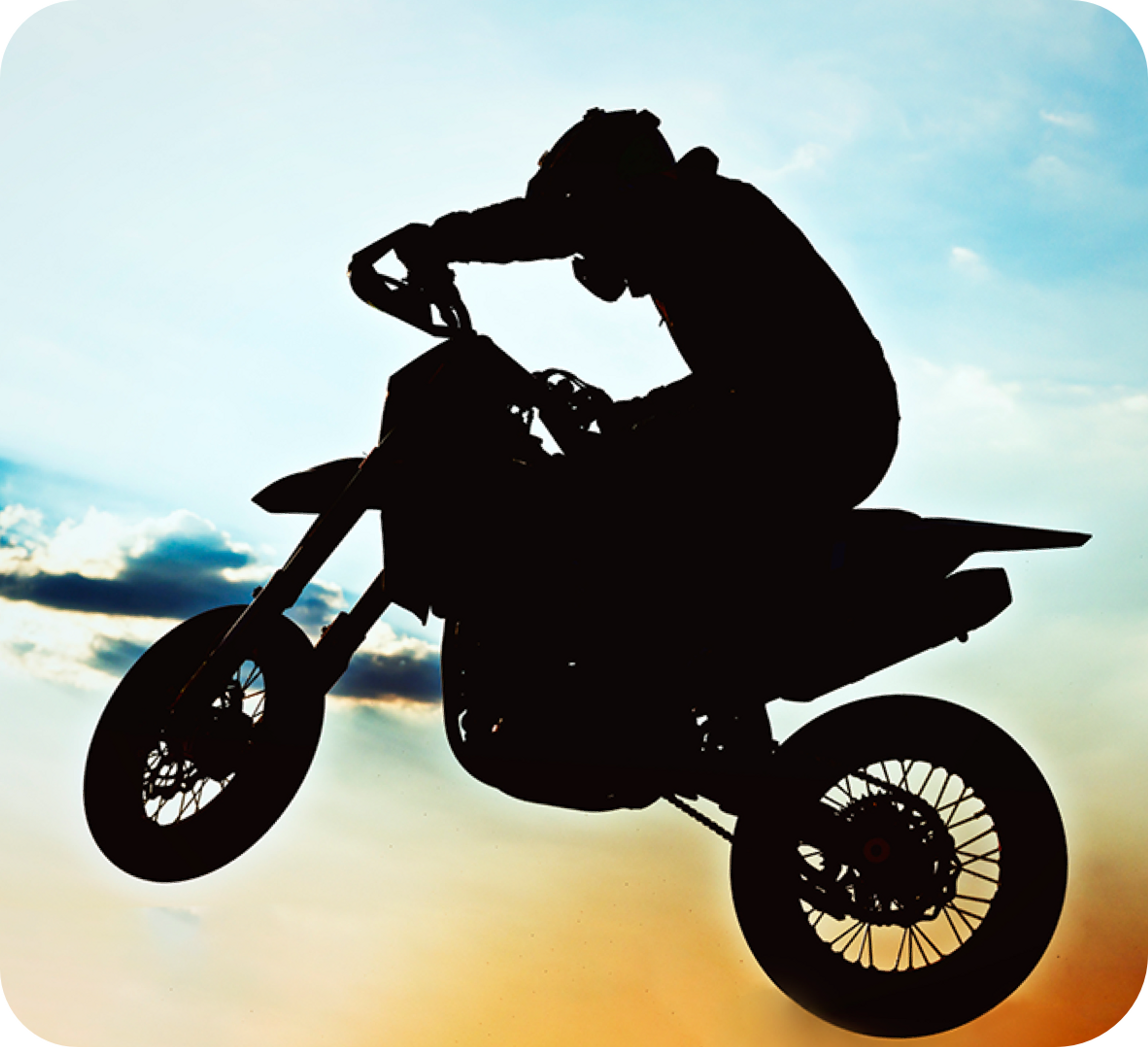 Picture of man riding a dirt bike in the air 