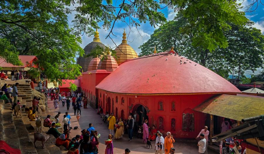 Pilgrims gather at the red, beehive-domed Kamakhya Temple in Guwahati, Assam, one of the most important Shakti Peeths