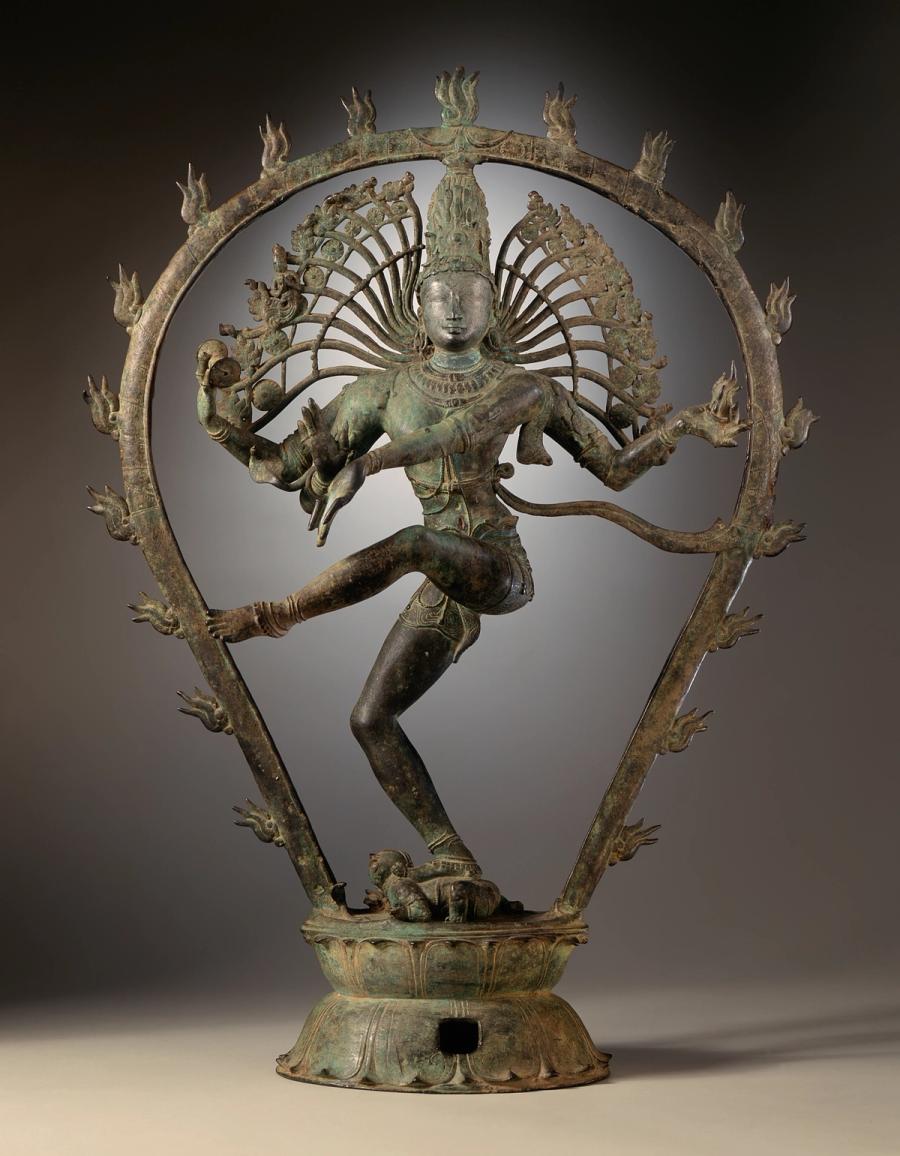 Bronze Nataraja sculpture of Shiva as Lord of Dance, four-armed with flame halo, one leg raised, foot upon the demon of ignorance