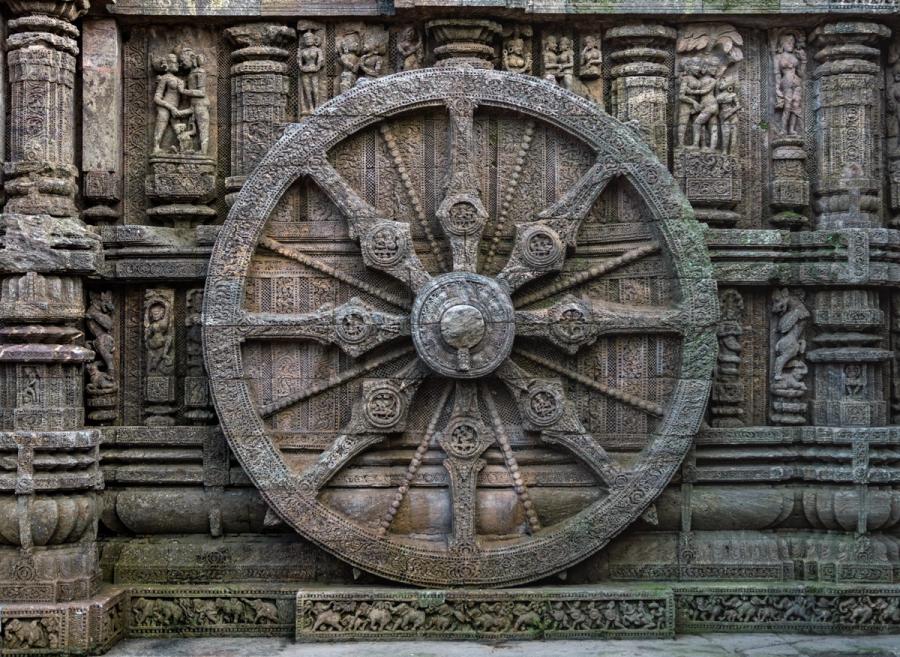 One of the twelve pairs of intricately carved stone wheels on the base of the Konark Sun Temple in Odisha, designed as a giant chariot for the sun god