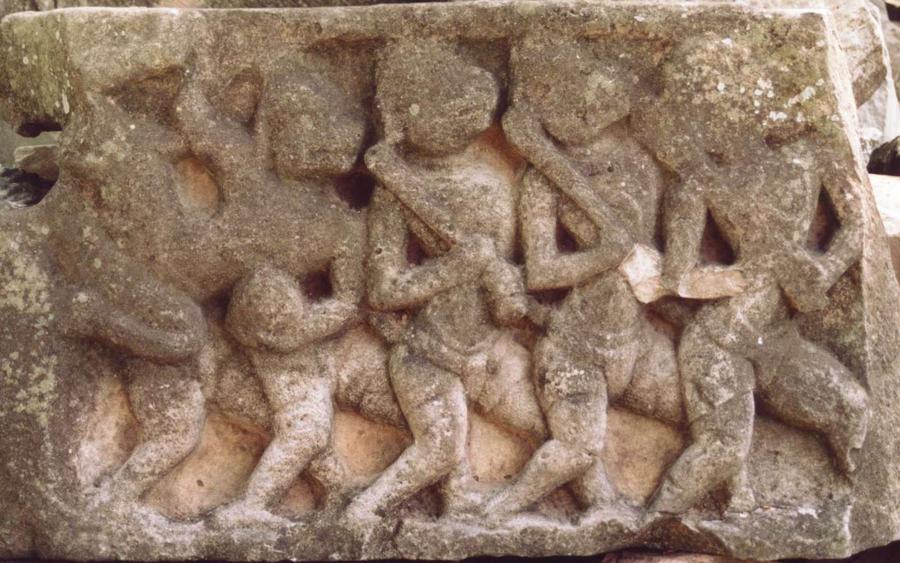 Stone relief of monkey warriors in a row, carved at Phimai