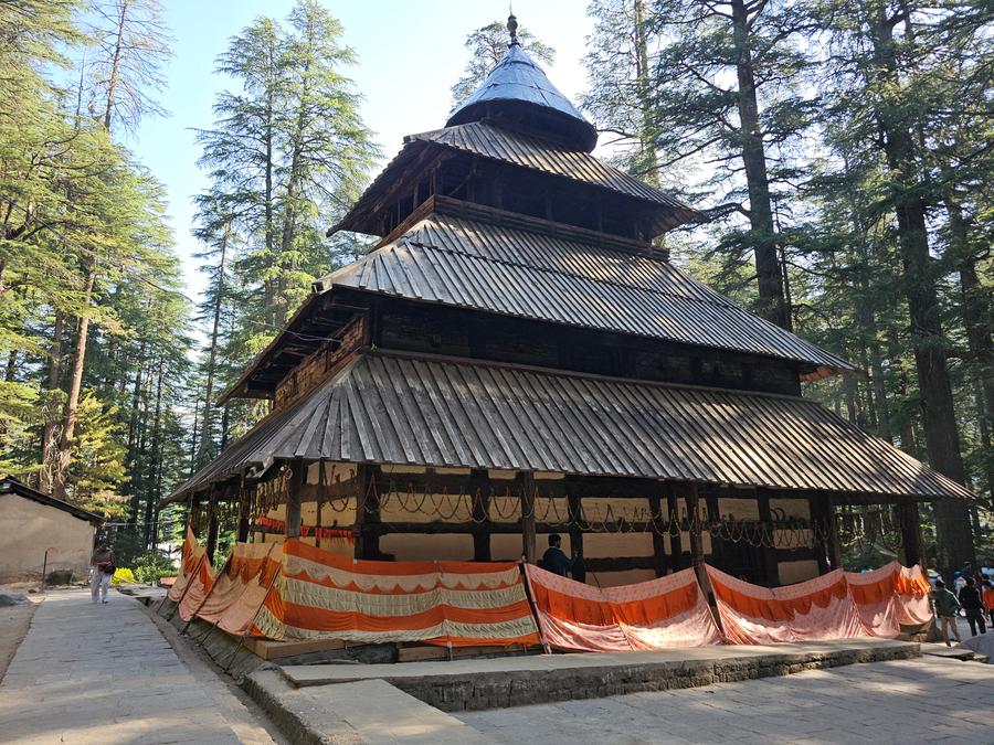 The multi-tiered wooden Hidimba Devi Temple among cedars at Dhungri, Manali, Himachal Pradesh.