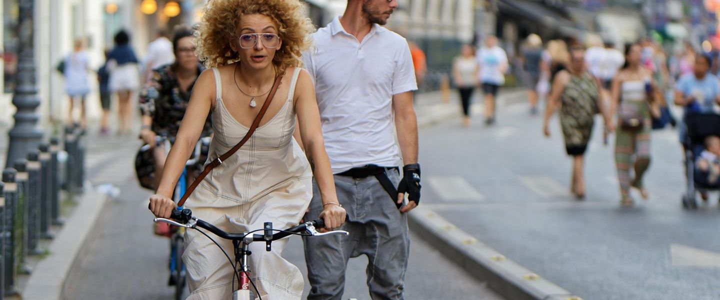 woman, bicycle, street, bike path, people, promenade, man, wheel, travel, urban, outdoors, bike track, lane, glasses, snapshot, street photography, weekend, transport, healthy, ecological