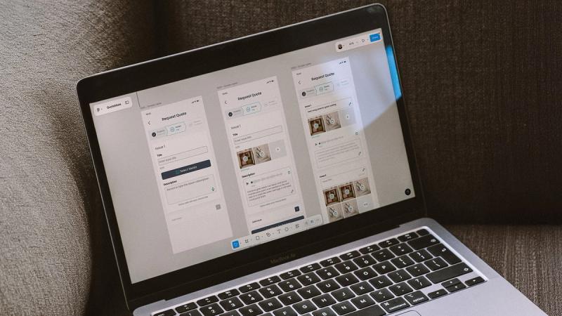QuoteMate Figma screens on laptop mockup
