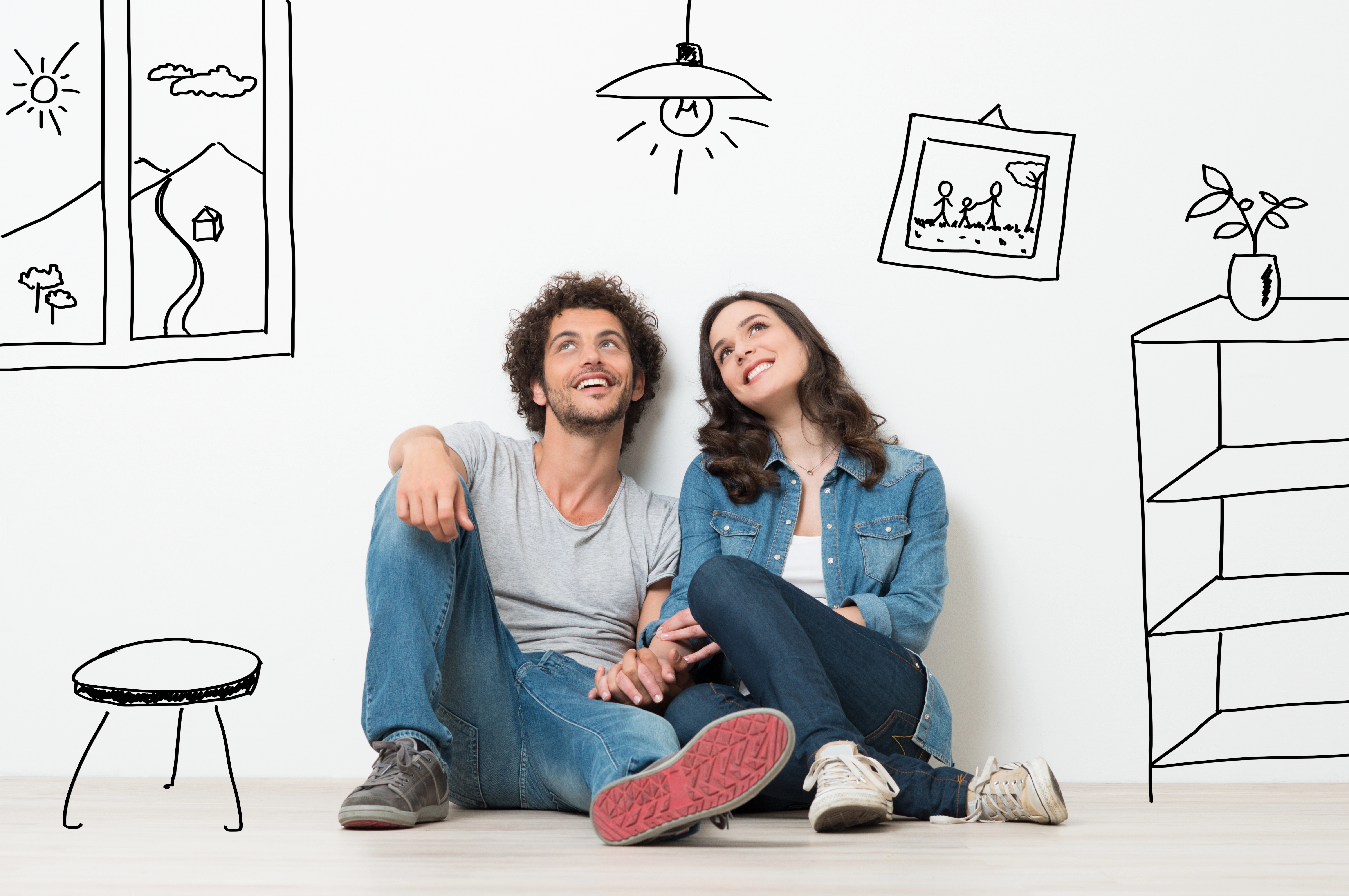 Young couple thinking of buying a home using USDA loan.