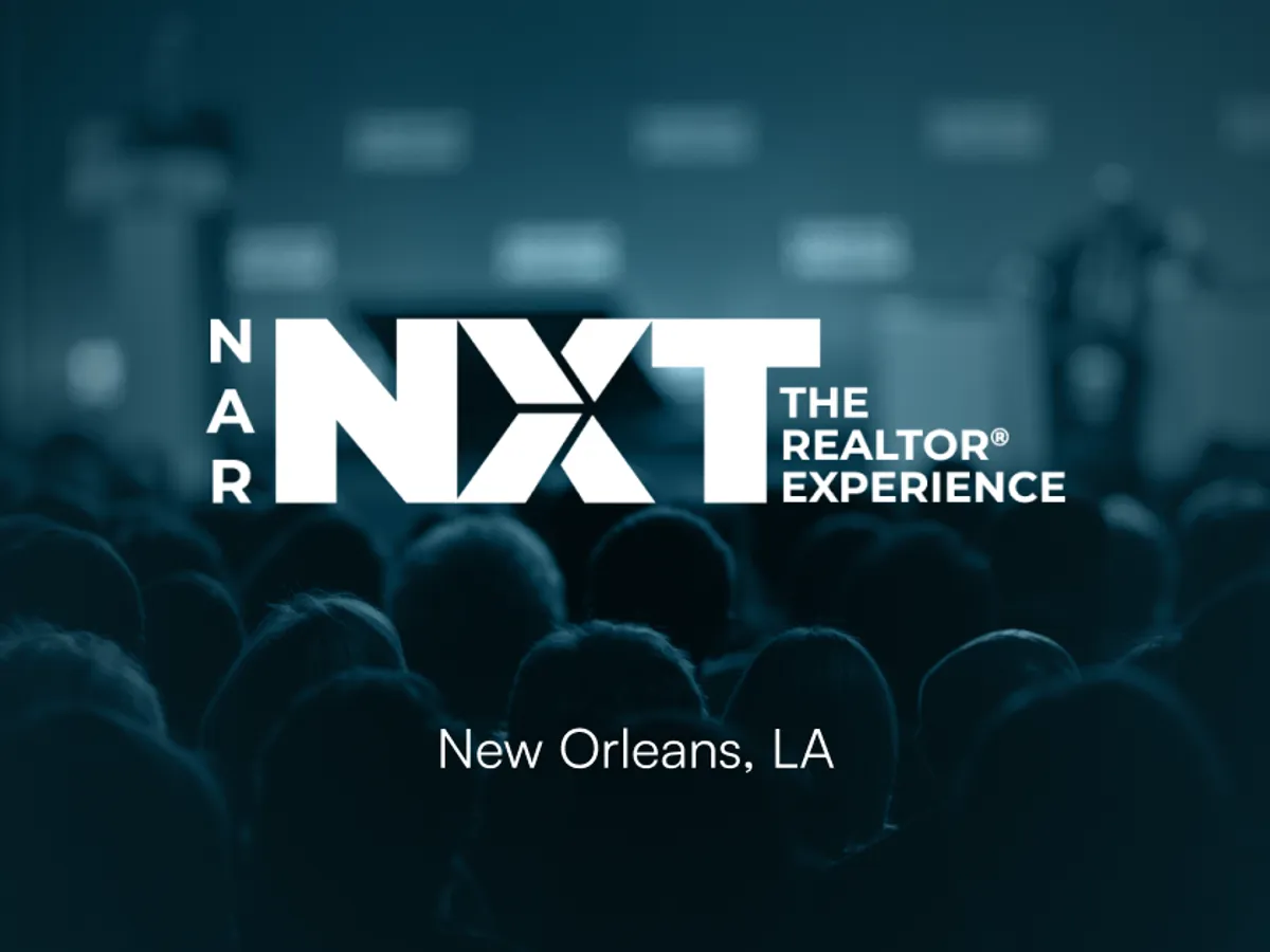 The NAR NXT 2026 'The REALTOR Experience' conference logo over a darkened audience, labeled New Orleans, LA