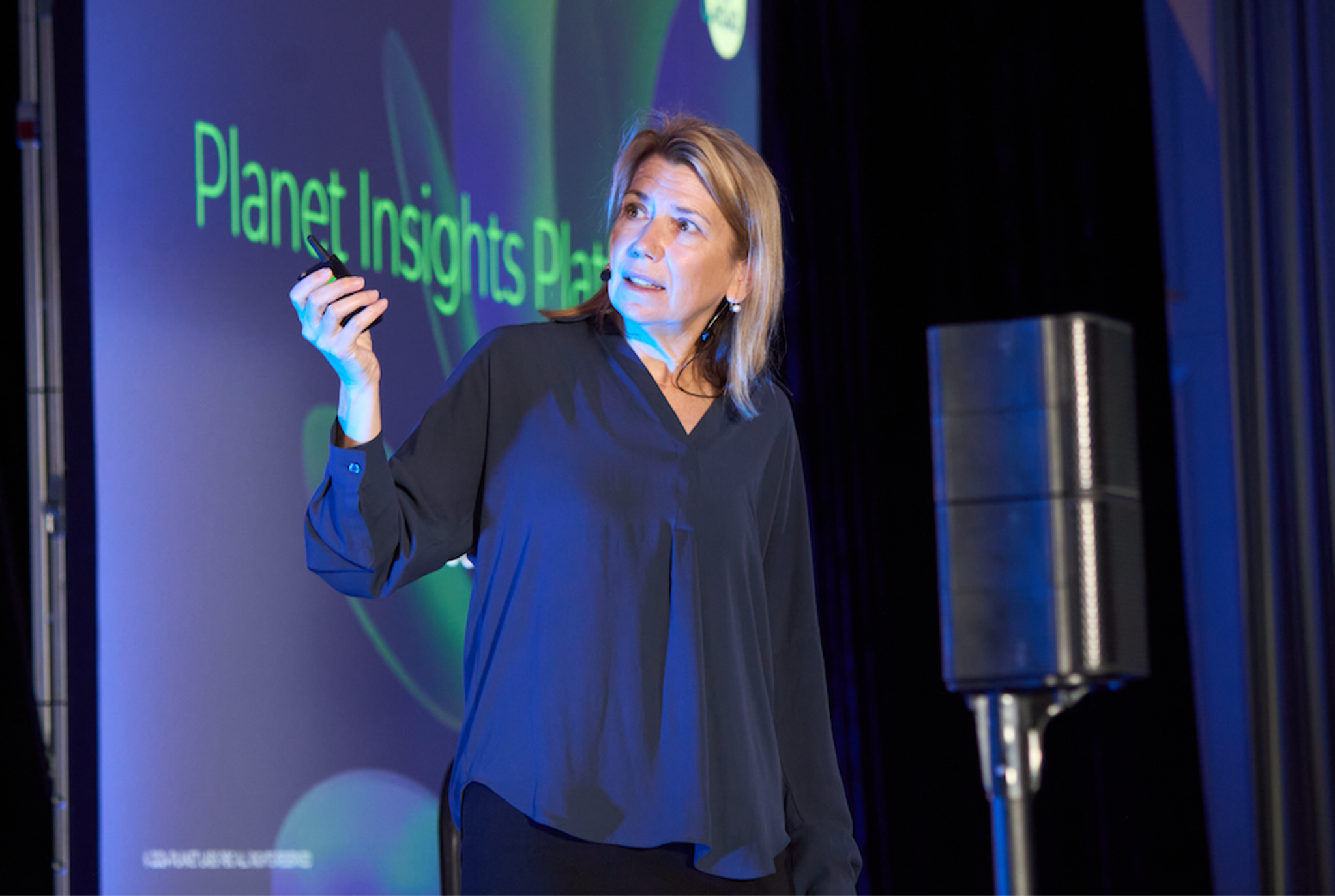 Ashley Johnson, Planet President and Chief Financial Officer, giving a keynote presentation at On The Road Bogotá.