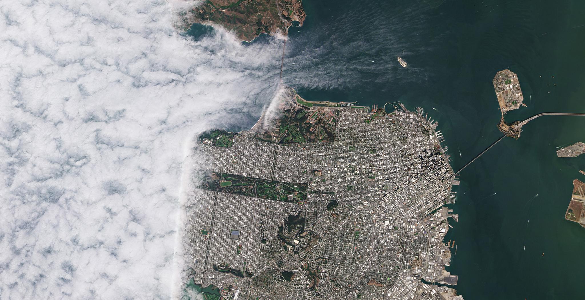 View of San Francisco (and the city's classic fog) from above, (c) 2019, Planet Labs Inc. All Rights Reserved.