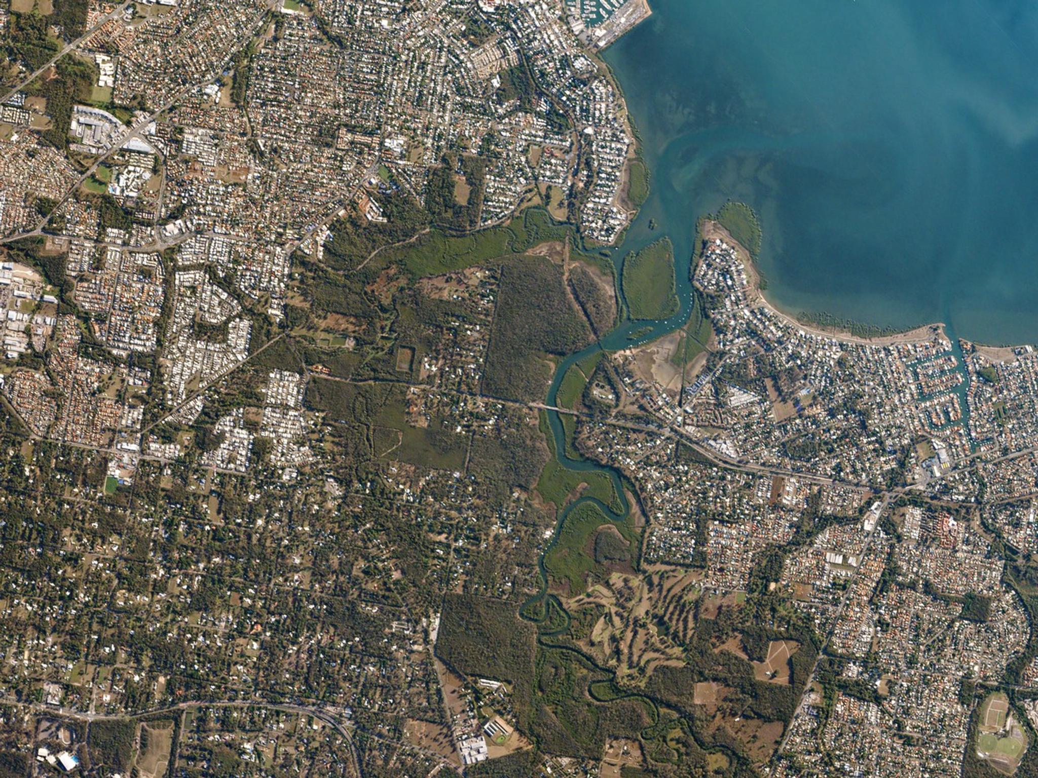 Suburban Brisbane surrounds Tingalpa Creek—a tidal waterway popular with kayakers, hikers, and birdwatchers. Captured on May 19, 2016. © 2016, Planet Labs Inc. All Rights Reserved.