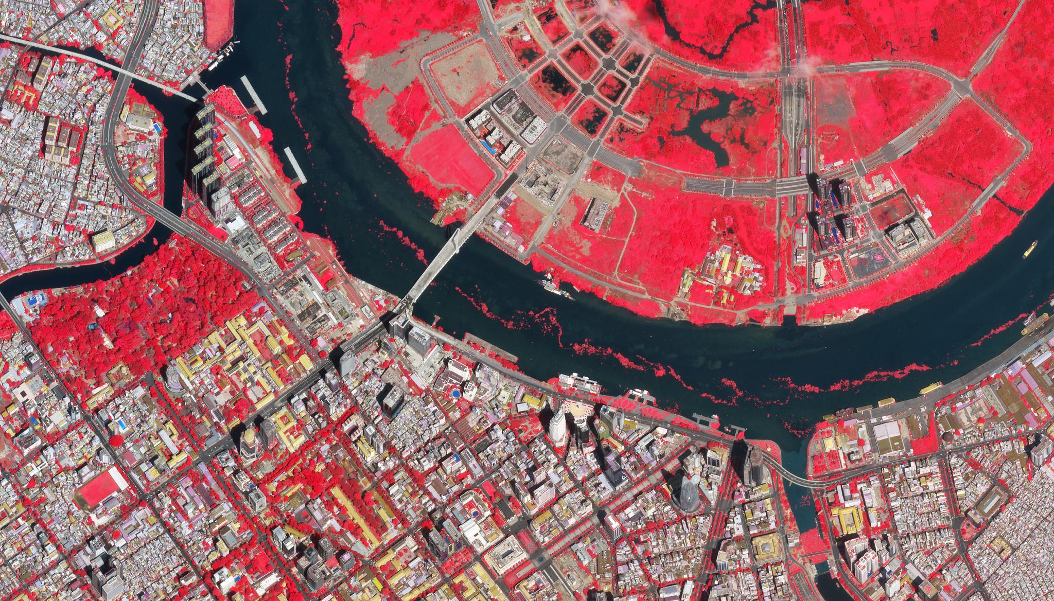 Planet SkySat false color image (near-infrared) of Ho Chi Minh City, Vietnam. NOAA has used such analyses on the Saigon River region to distinguish between marine debris and marine vegetation for their reports. © 2022, Planet Labs PBC. All Rights Reserved.