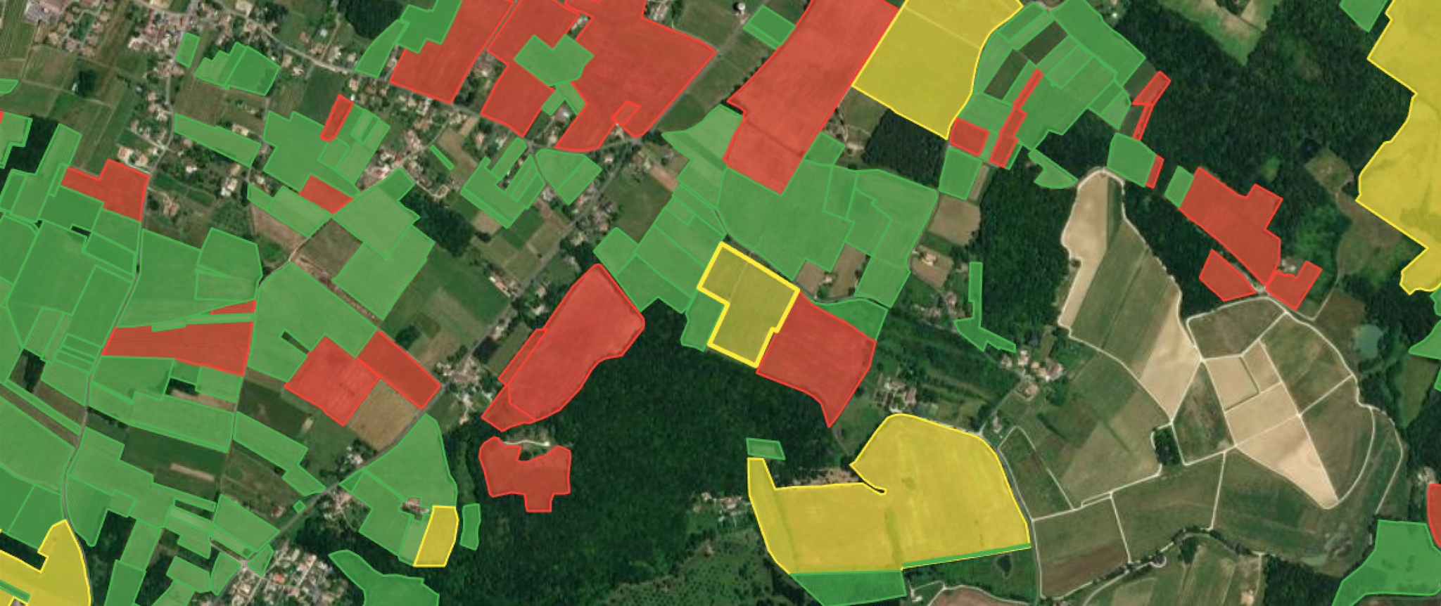 This illustration from the Area Monitoring Browser interface shows claimed crops colored red, yellow or green (the traffic light system), according to the assessment of whether their claim of permanent crop status is valid.