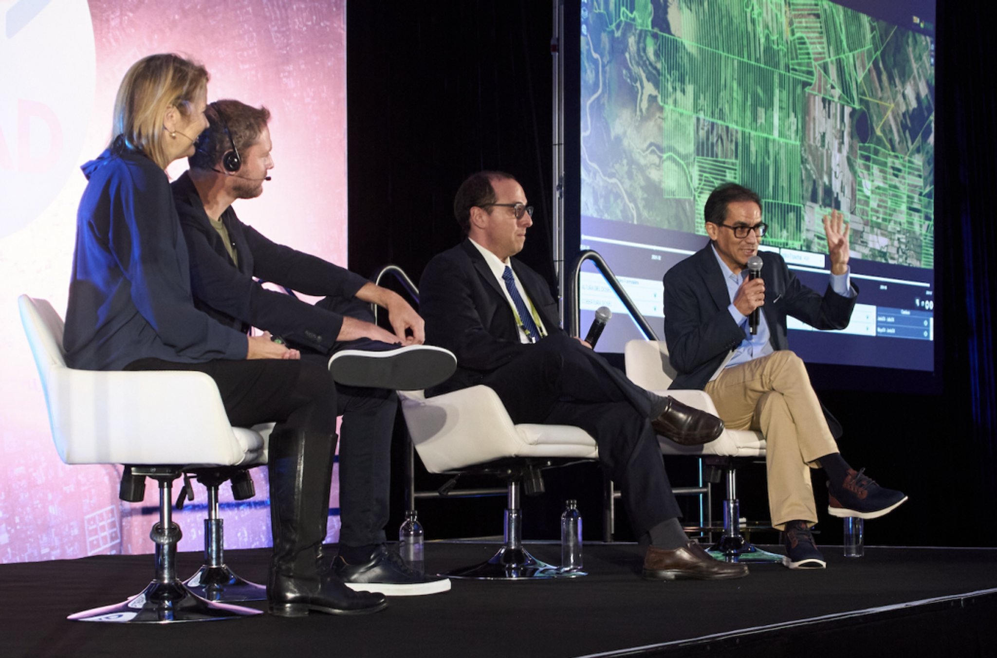 Ashley Johnson, Planet President and Chief Financial Officer (far left), and Thijs Van Leeuwen, Planet Sr. Director of Product (left), join Felipe Trujillo, General Manager at Procalculo Prosis S.A.S. (right), and Alfredo Aramayo, President of CIVIS (far right) for a keynote on stage at On The Road Bogotá.