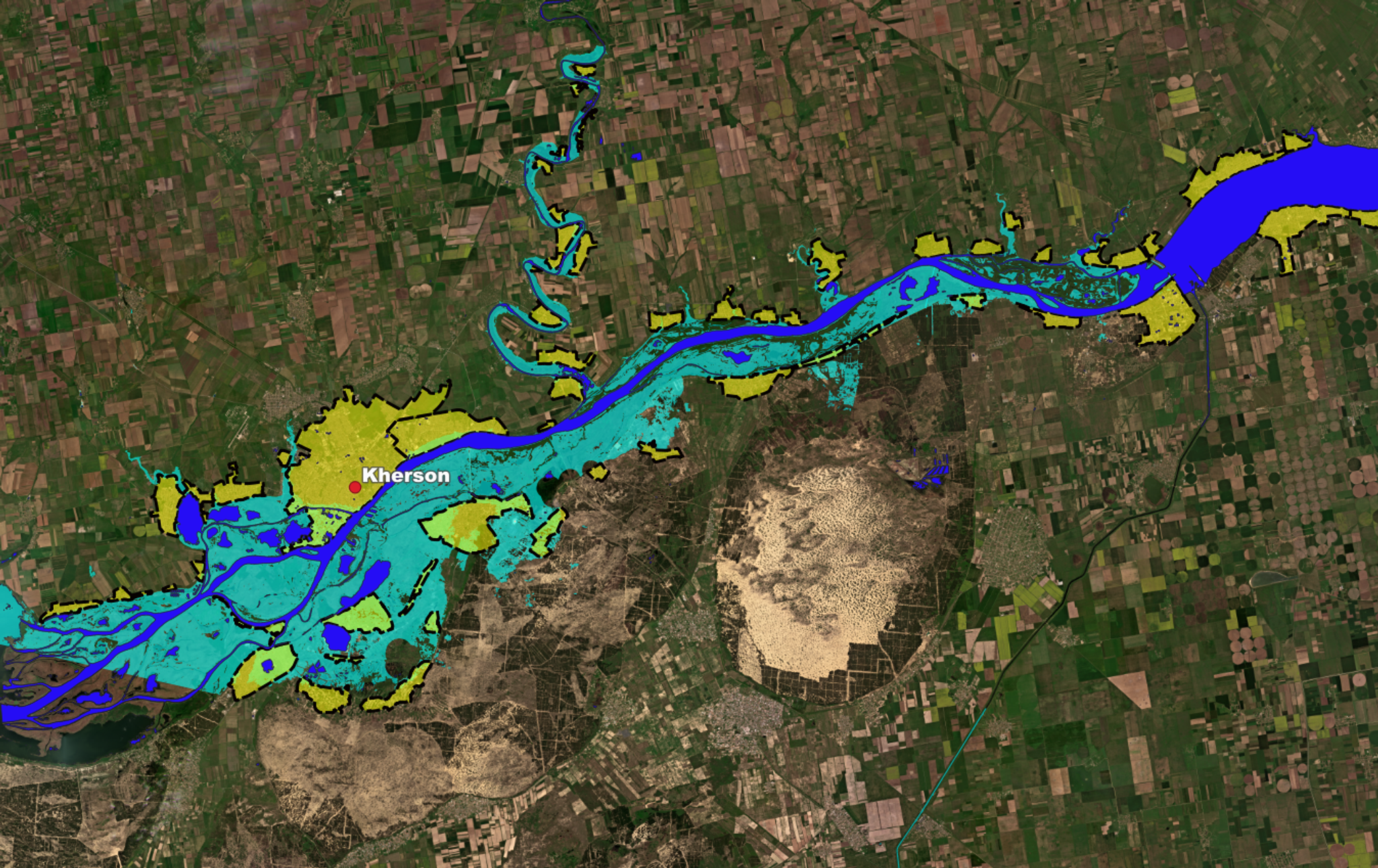 Flooding extent with cities. Yellow denotes cities. Areas in light green are flooded parts of the cities. Dark blue shows water prior to dam collapse, and light blue denotes flooded areas. Credit: NASA Harvest, Sertit iCube, Planet Labs PBC