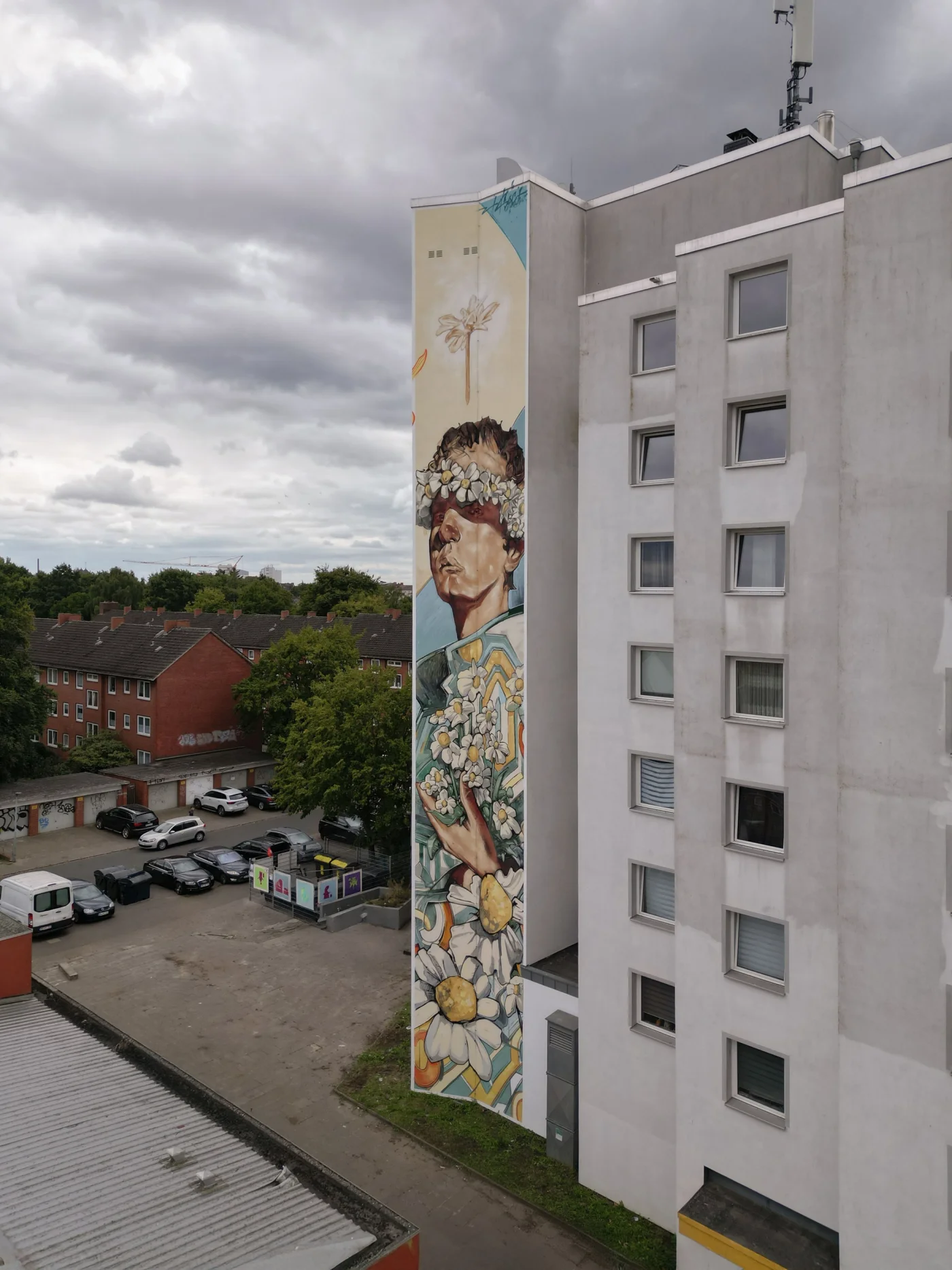 zona16-mural-boy-with-flowers-rostocker-bremen-sideview-jpg
