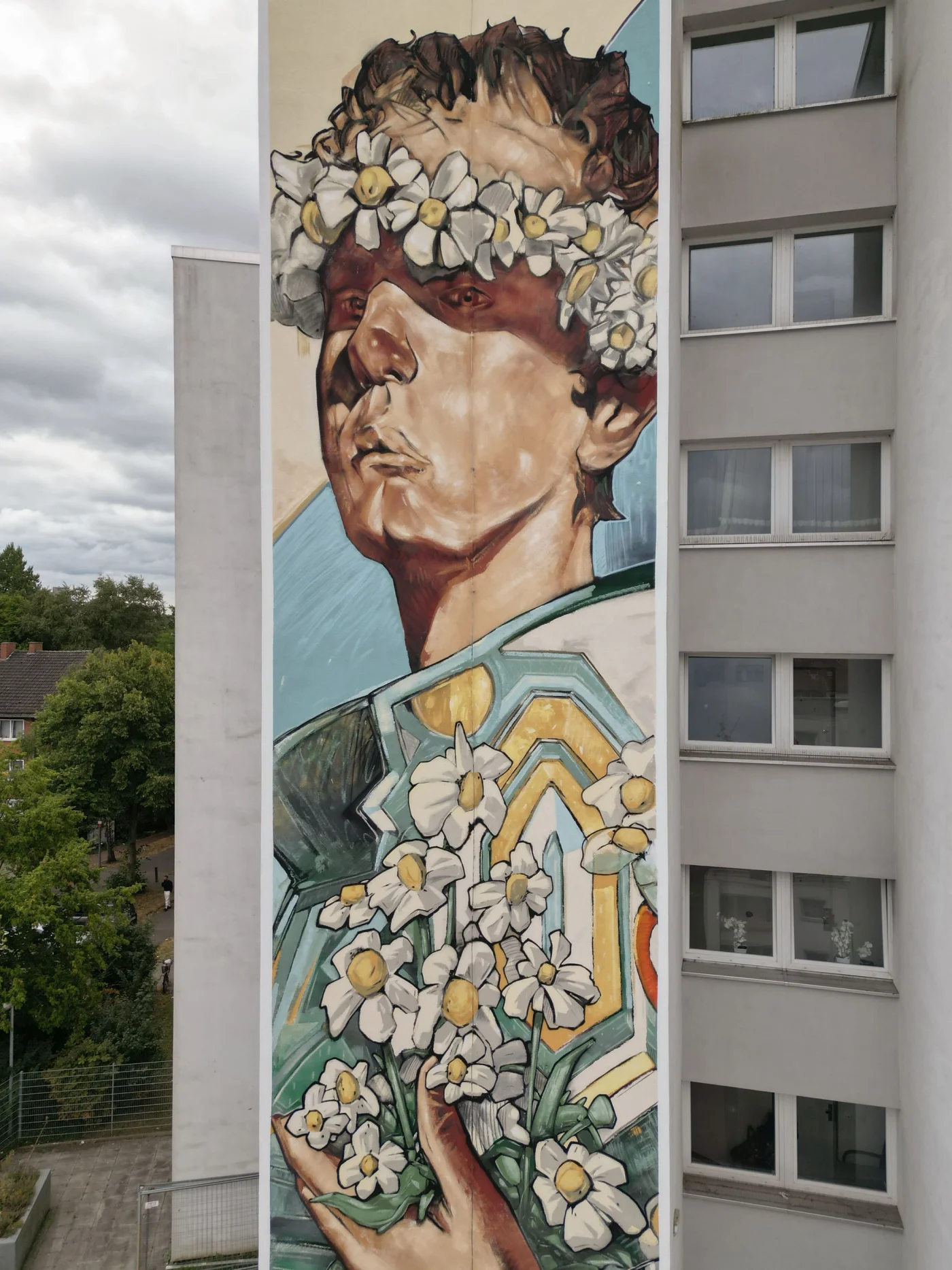 zona16-mural-boy-with-flowers-rostocker-bremen-sowet-wall-jpg