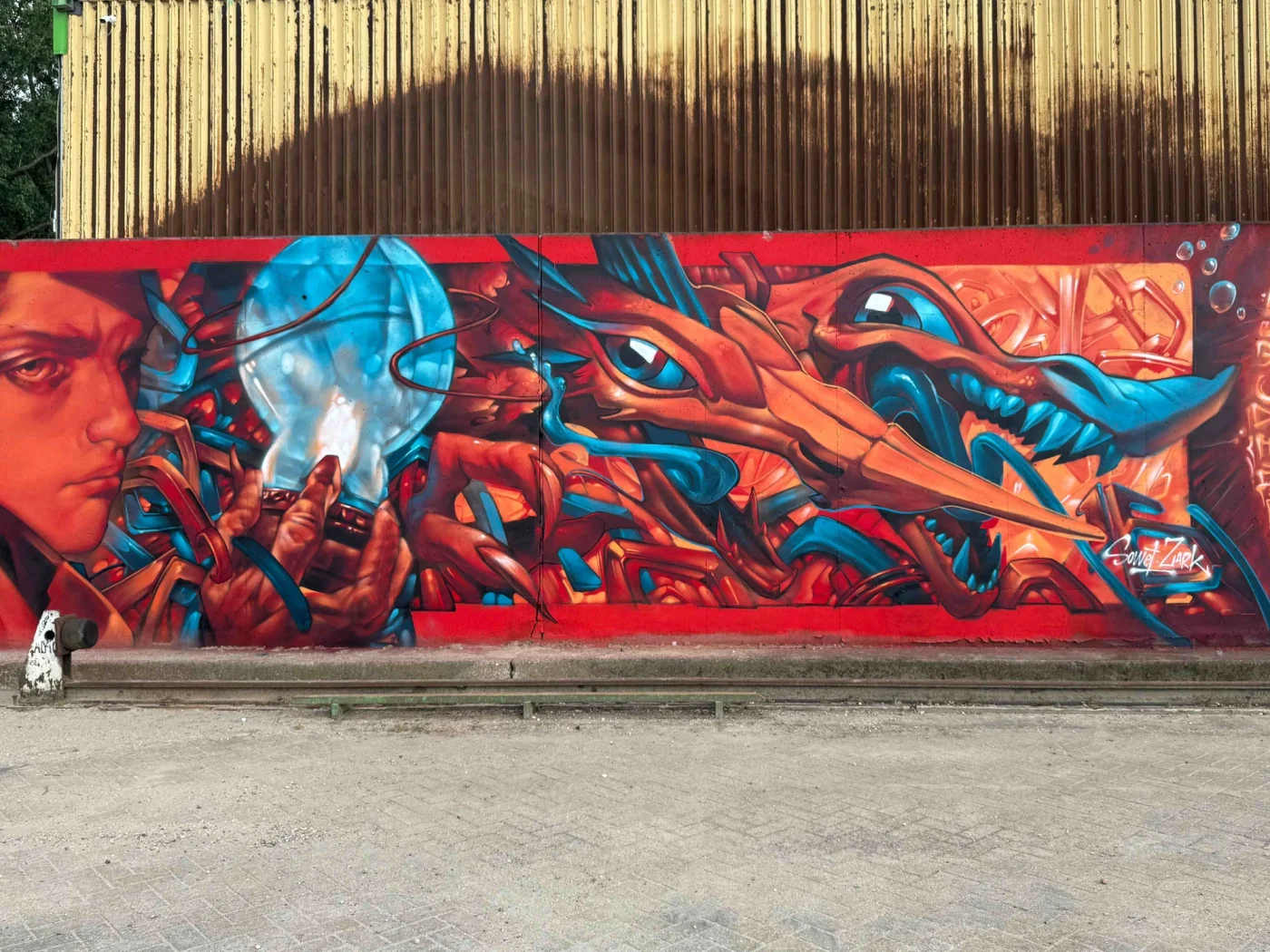 zona16 mural mago e draghi rinjhaven harbour front view image 2