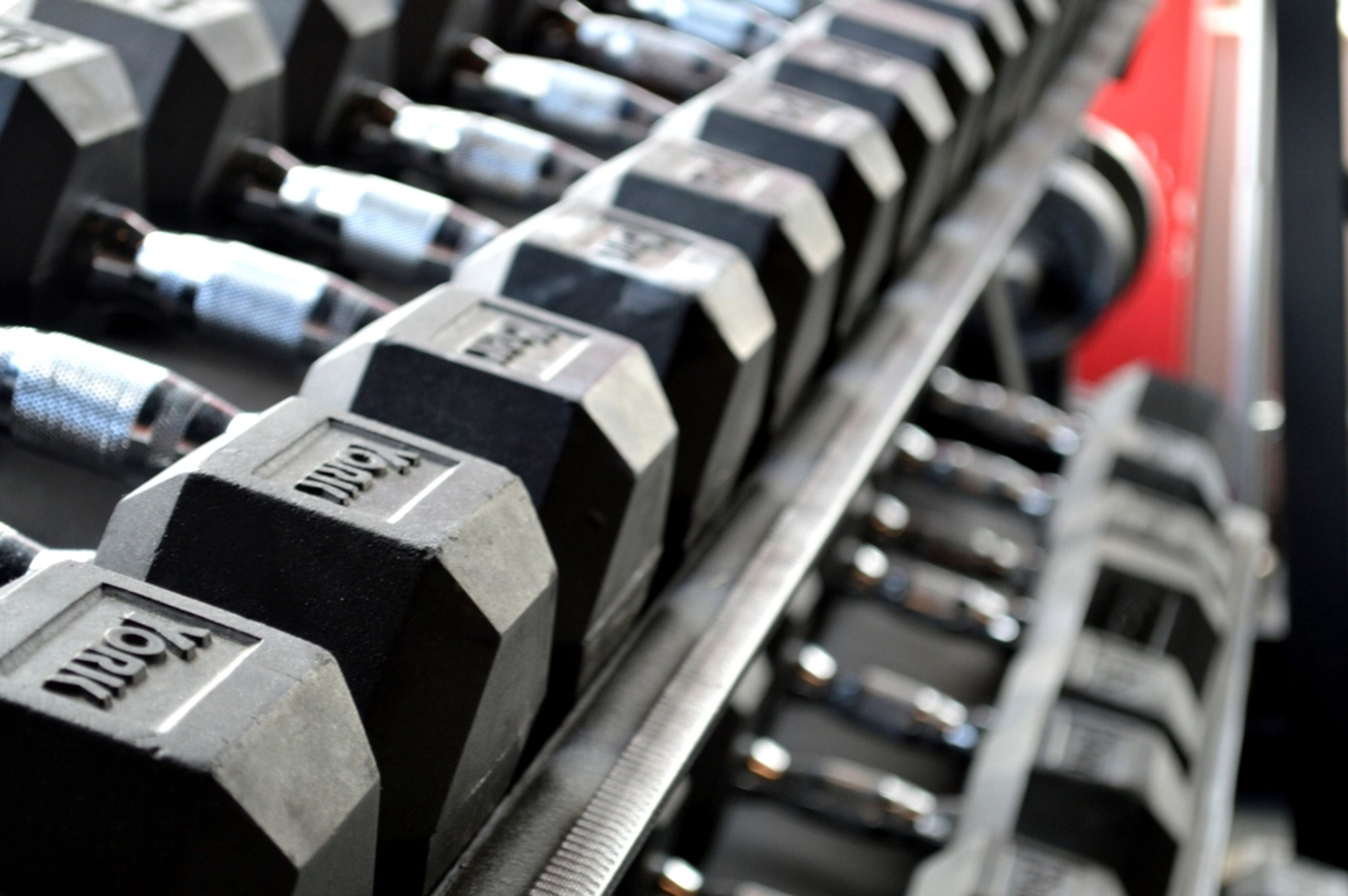 Rack of dumbbells in a compact gym fit-out