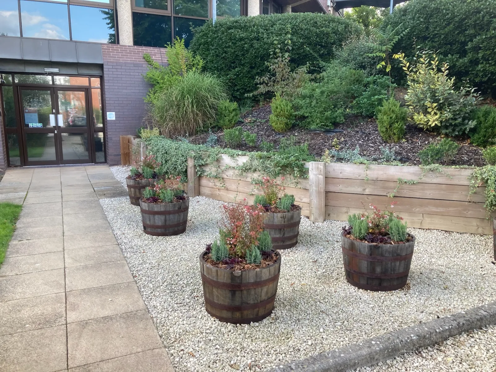 Seasonal entrance plant displays at hotel